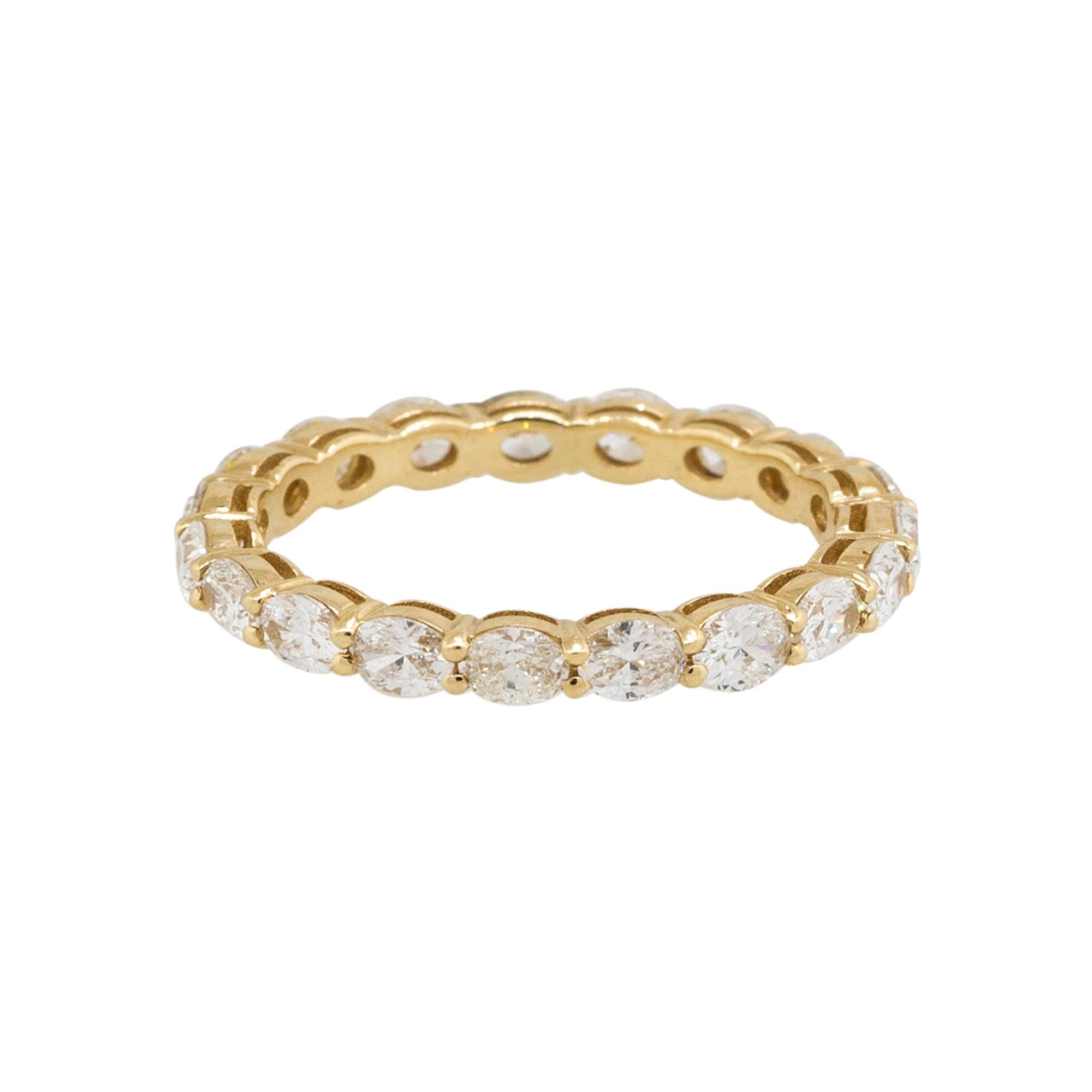 Material: 14k Yellow Gold
Diamond Details: Approx. 1.61ctw of oval cut Diamonds. Diamonds are G/H in color and VS in clarity.
Size: 6.25 
Measurements: 21.55mm x 2.35mm x 21.55mm
Weight: 1.6g (1dwt)
Additional Details: This item comes with a