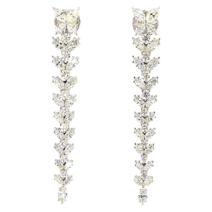 Boucles d'oreilles en or serties d'un diamant rond taille brillant de 1.61 carats en vente