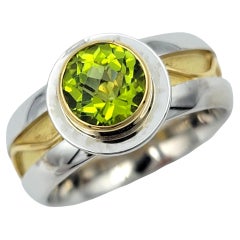 1.61 Carat Round Cut Bezel Set Peridot Solitaire Ring in Two-Tone 18 Karat Gold