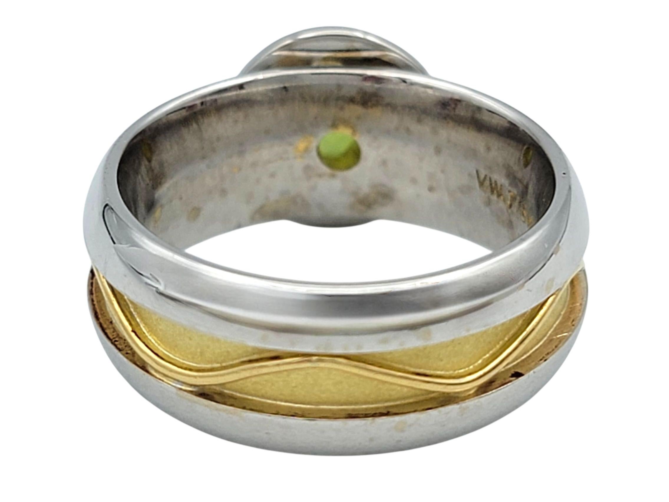 1.61 Carat Round Cut Bezel Set Peridot Solitaire Ring in Two-Tone 18 Karat Gold For Sale 1