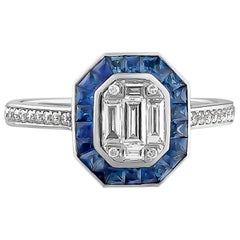 1.61 Carat Sapphire Ring Set with Round and Baguette Diamonds 18 Karat Gold Ring