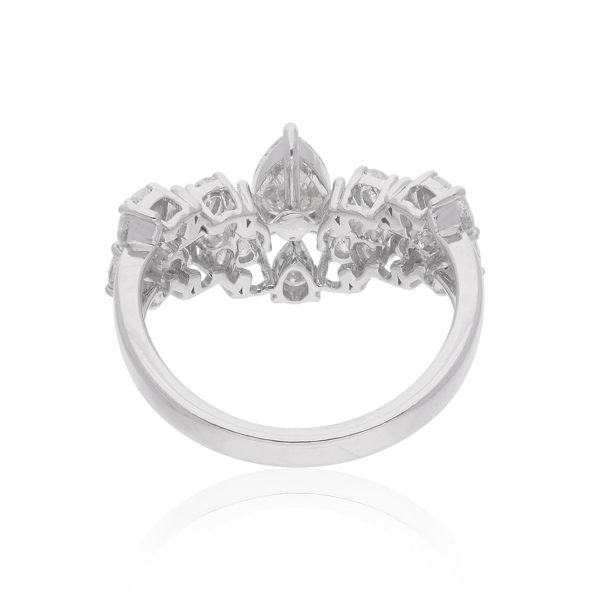 Embrace the allure of timeless elegance with this breathtaking 1.61 Ct. Pear Diamond Chevron Design Ring, meticulously crafted in 14 Karat White Gold. Handmade with precision and passion, this exquisite piece of jewelry is a true testament to