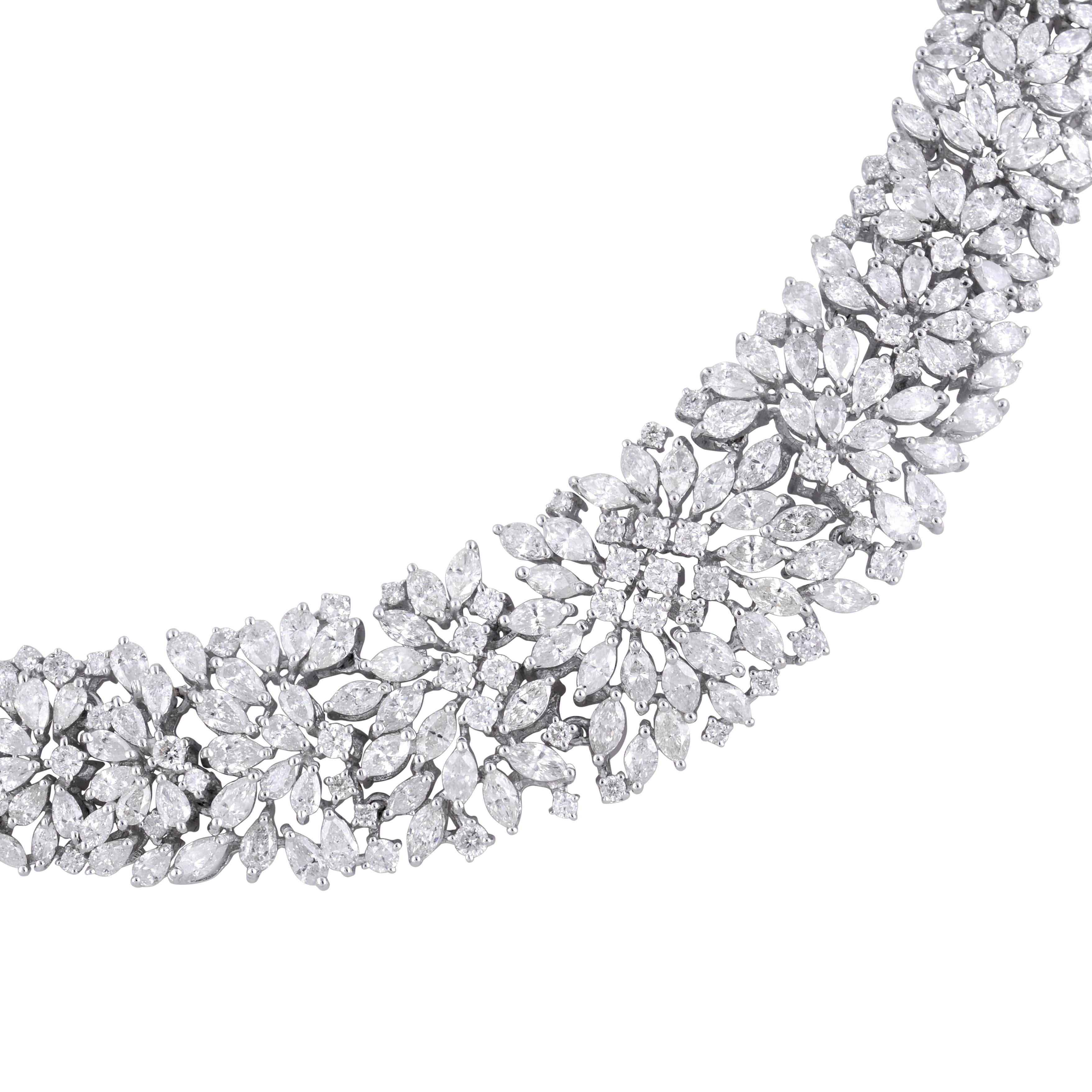 Dive into a world of opulence and luxury with this magnificent 16.10ct SI/HI Pear Marquise Round Diamond Necklace. Meticulously handcrafted, this exquisite piece features a breathtaking array of pear, marquise, and round-cut diamonds, totaling an