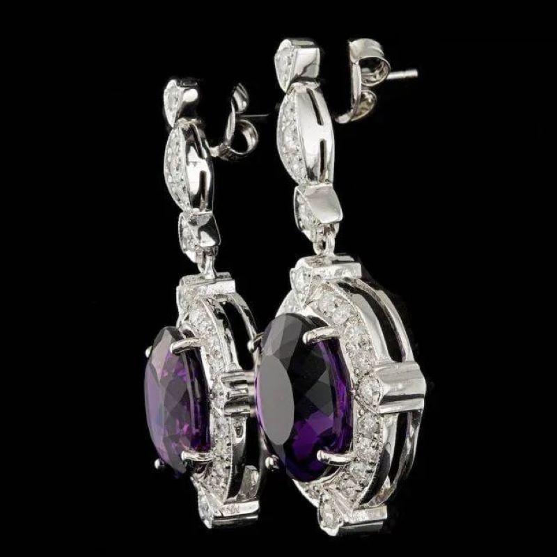 16.10ct Natural Amethyst and Diamond 14K Solid White Gold Earrings

Total Natural Oval Amethyst Weight: 14.40 Carats 

Amethyst Measures: Approx.  14 x 12 mm

Total Natural Round Cut White Diamonds Weight: Approx.  1.70 Carats (color G-H / Clarity