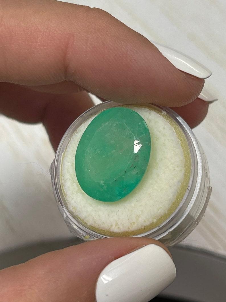 Modern 16.15 Carat Earthy Green Colombian Emerald Oval Cut - May Birthstone Gem For Sale