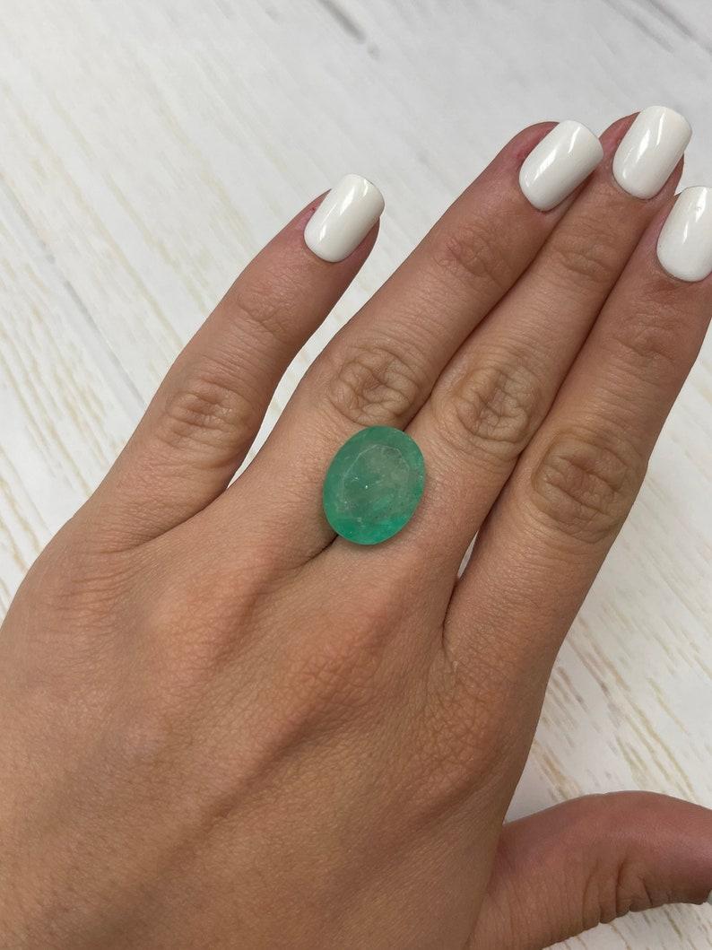 16.15 Carat Earthy Green Colombian Emerald Oval Cut - May Birthstone Gem For Sale 4