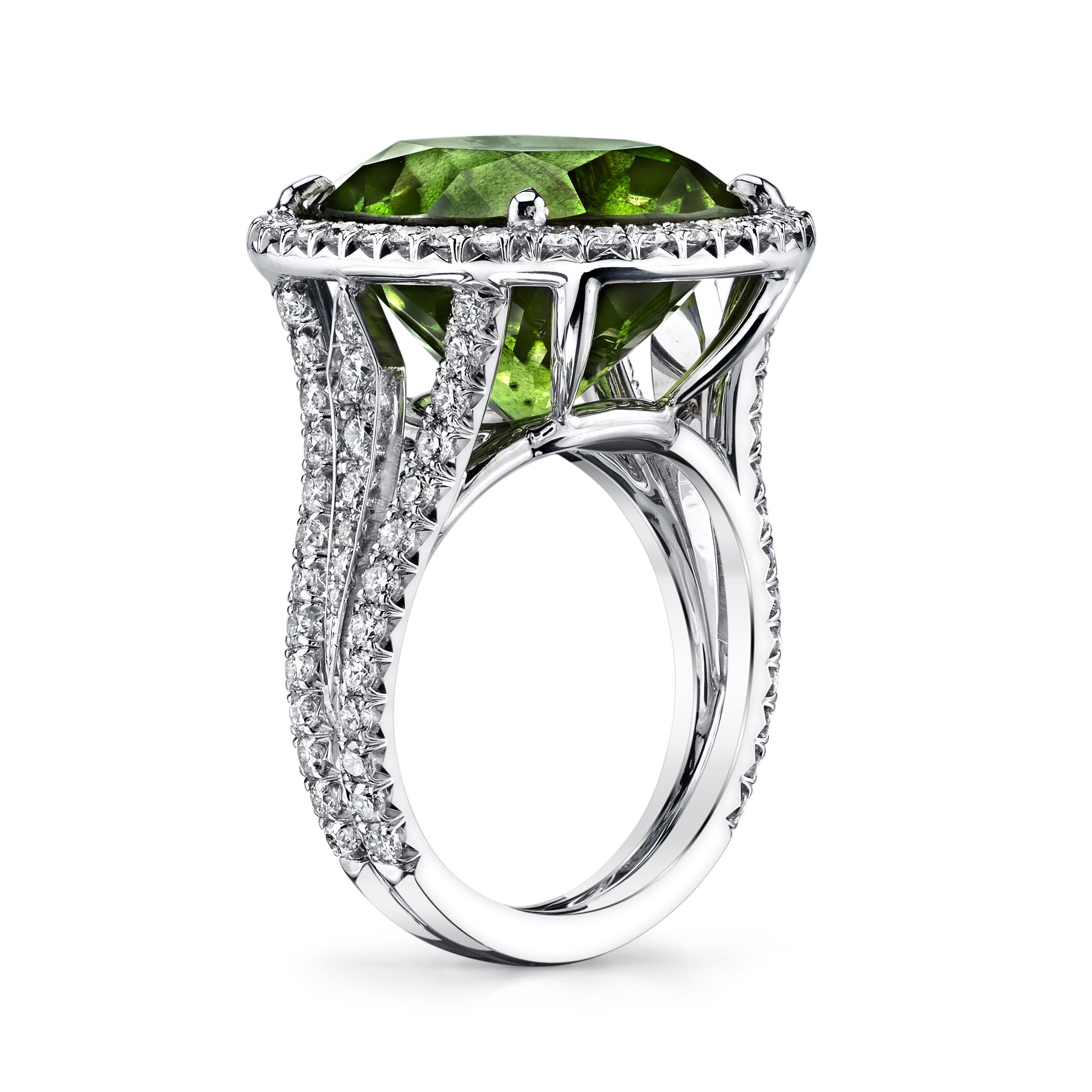 Oval Cut 16.16ct Burmese Peridot Ring Adorned with 1.15ct Diamonds and Set in 18 KW