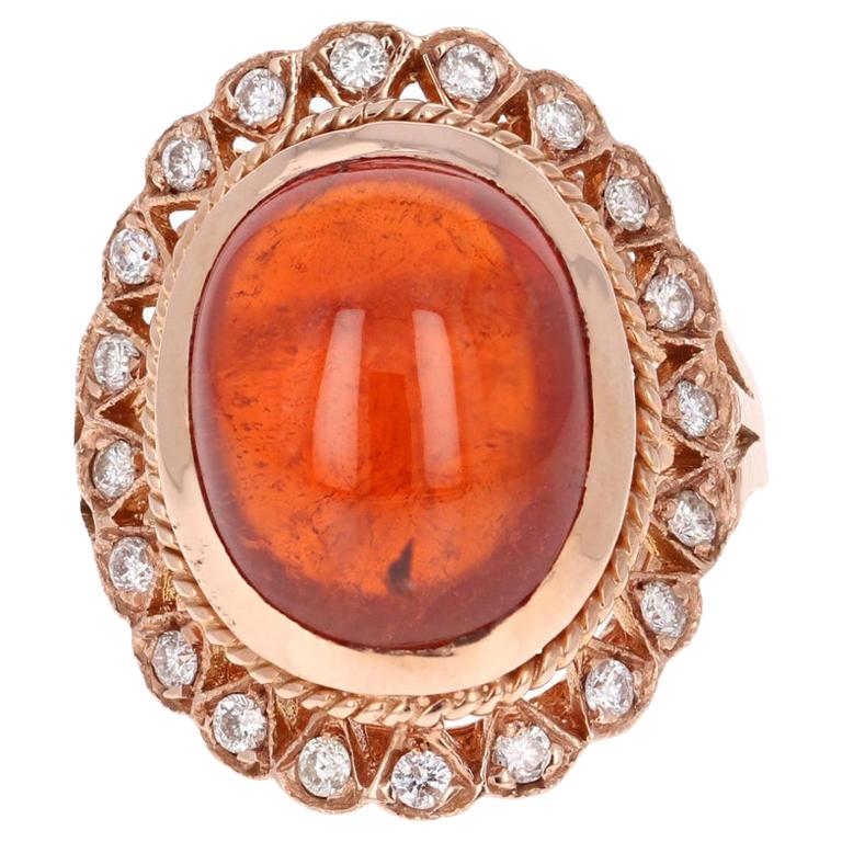 Bague en or rose 14 carats avec grenat spessartine cabochon de 16,18 carats et diamants