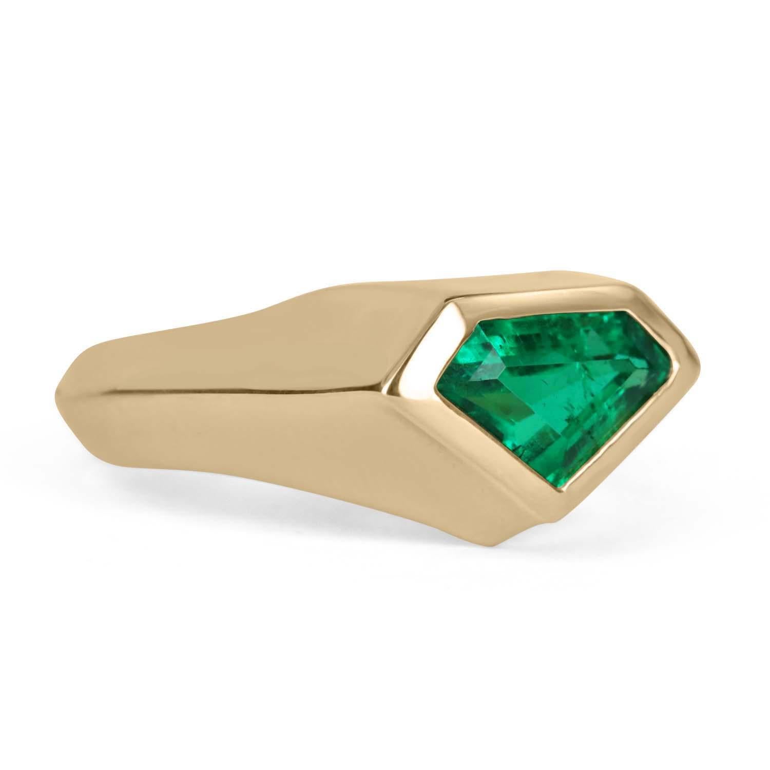 Displayed is a one-of-a-kind, Colombian emerald, superman cut solitaire ring. This custom piece is extremely unique, as having emeralds cut in these rare shapes is very uncommon. This Colombian emerald superman/kite cut showcases a rare, 1.61-carat