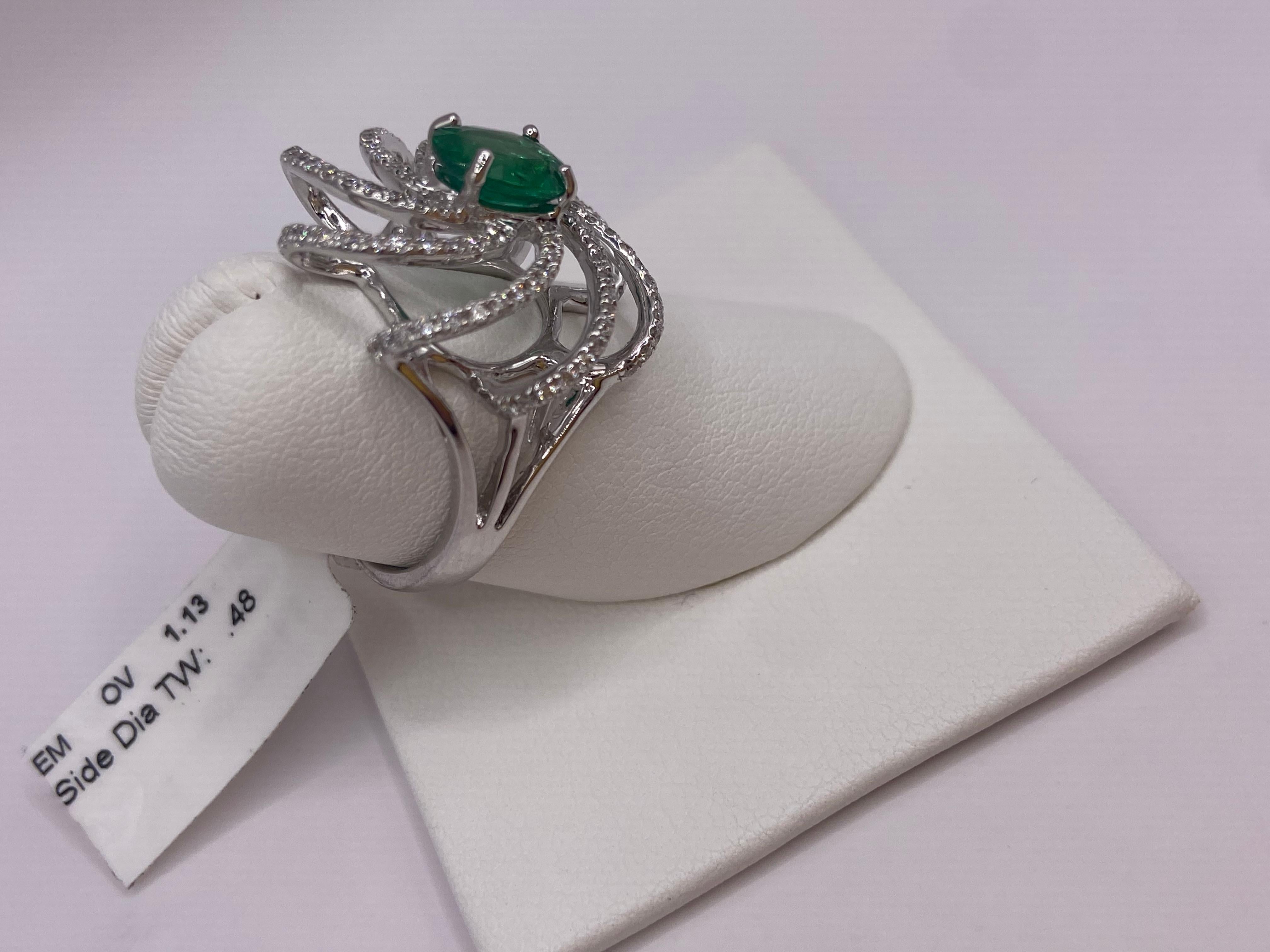 Modern 1.61ctw Oval Emerald & Round Diamond Ring in 18KT White Gold For Sale