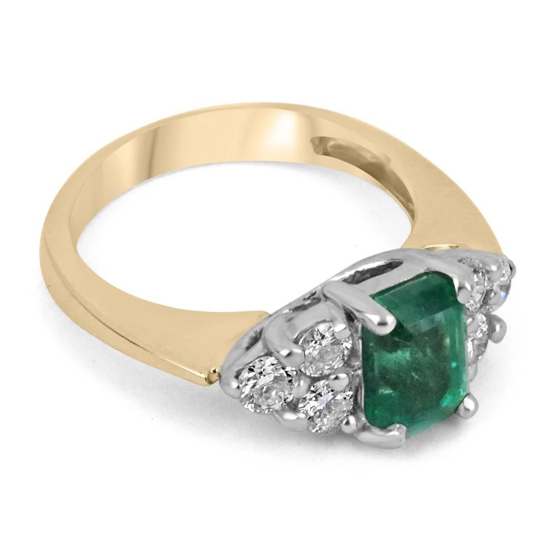 A rare emerald and diamond cocktail 14K ring. An extraordinary custom-created ring. Dexterously handcrafted in gleaming solid 14K yellow and white gold, this ring features a high-quality, 1.25-carat natural Zambian emerald, emerald cut. Set in a