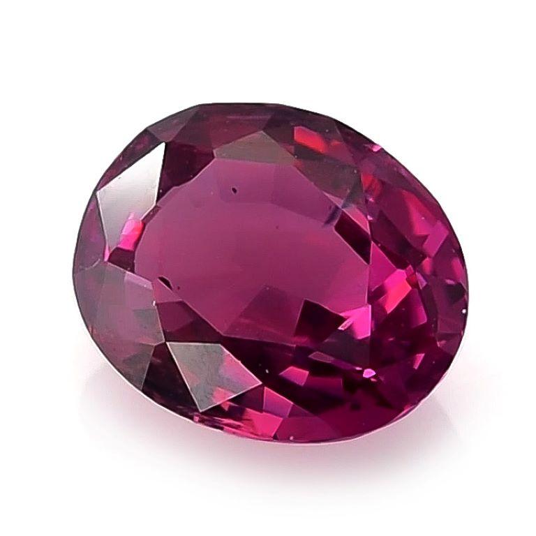 Identification: Natural Pink Sapphire

• Carat: 1.62 carats
• Shape: Oval
• Measurement: 7.54 x 6.19 x 3.80 mm
• Color: vivid pink
• Cut: brilliant/step
• Color Zoning: None
• Clarity: very eye clean
• Origin: Sri Lanka
• Treatment: Heated

Sapphire