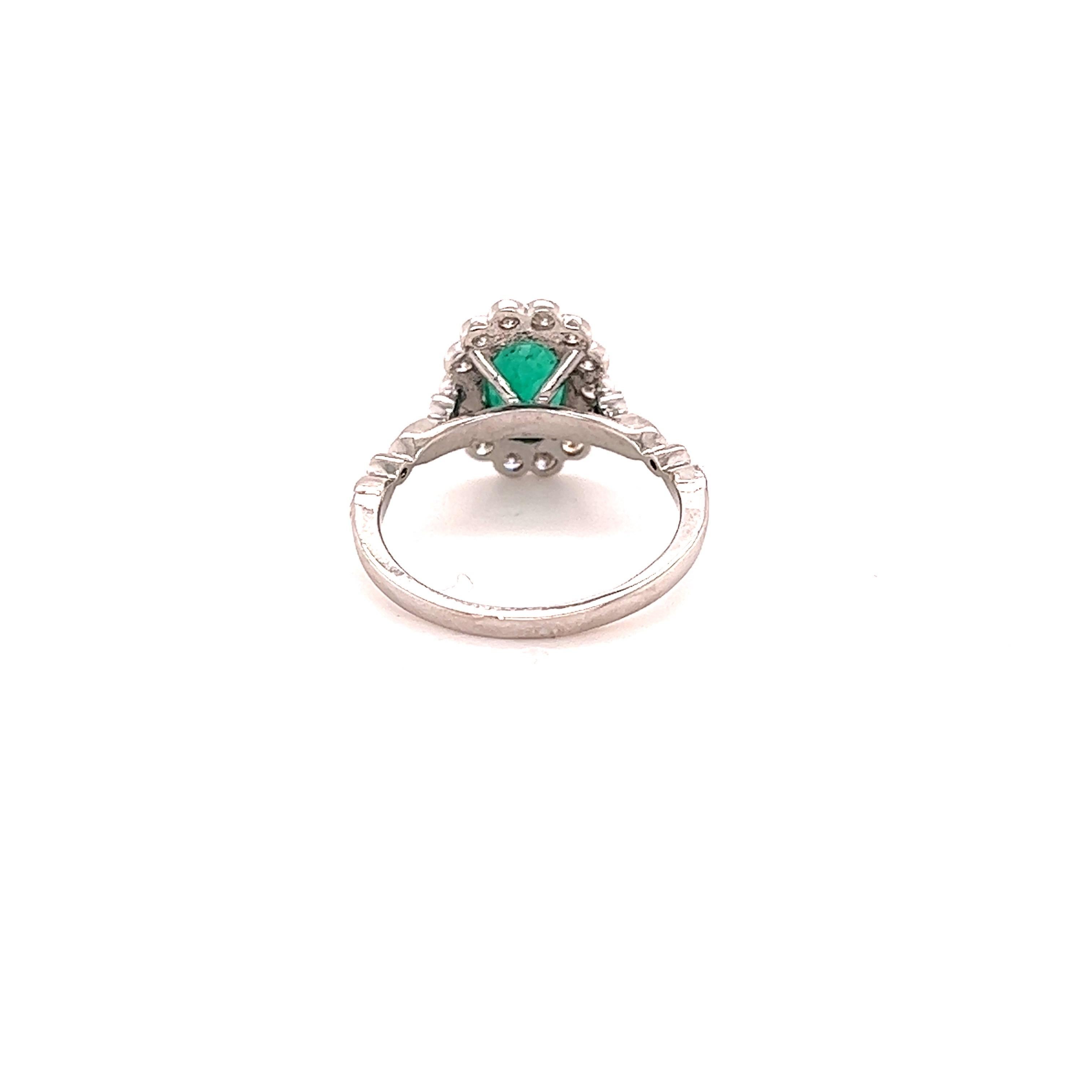 Oval Cut 1.62 Carat Emerald Diamond White Gold Engagement Ring For Sale