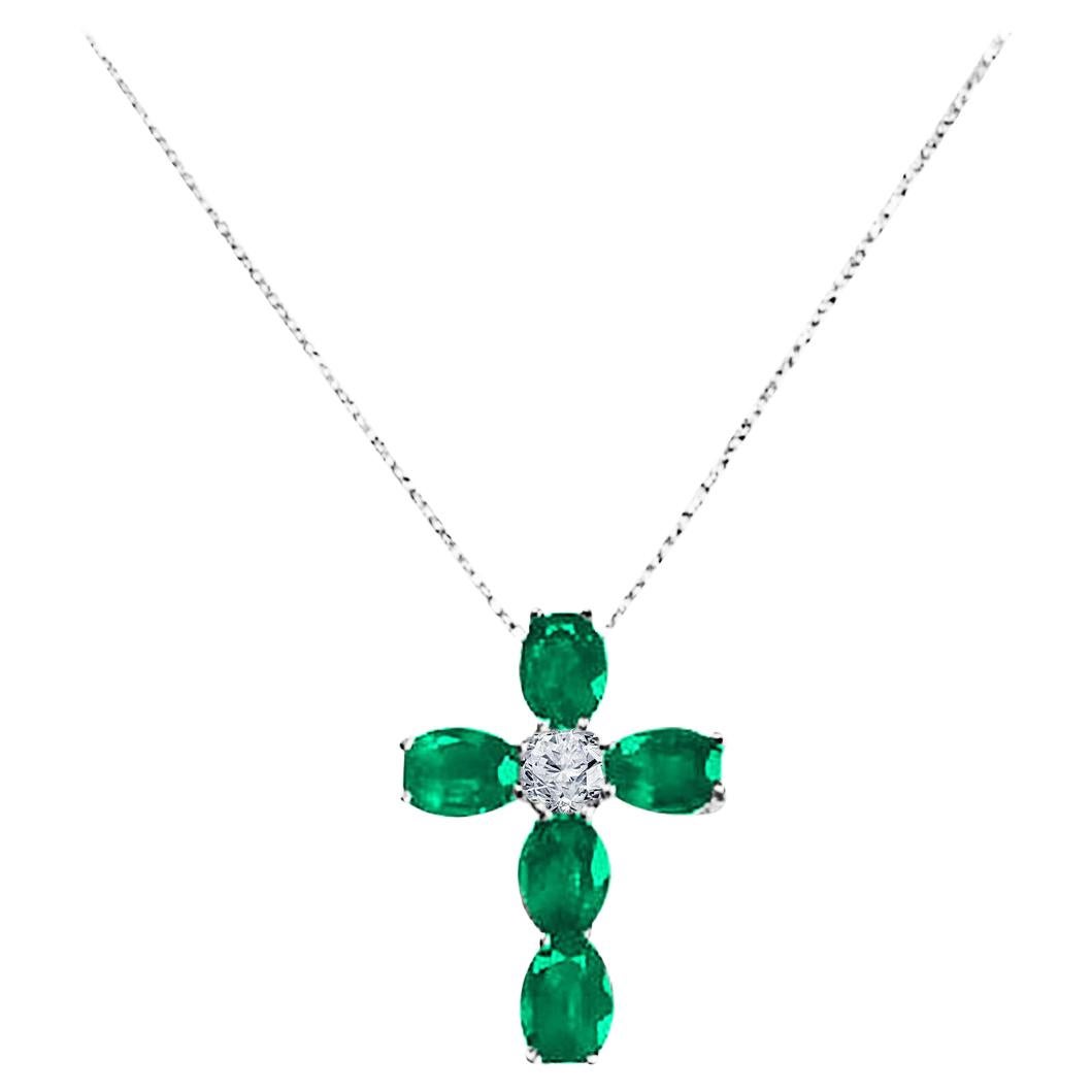 1.62 Carat Oval Cut Emerald and Natural Diamond Cross Pendant in 18k ref2359 For Sale