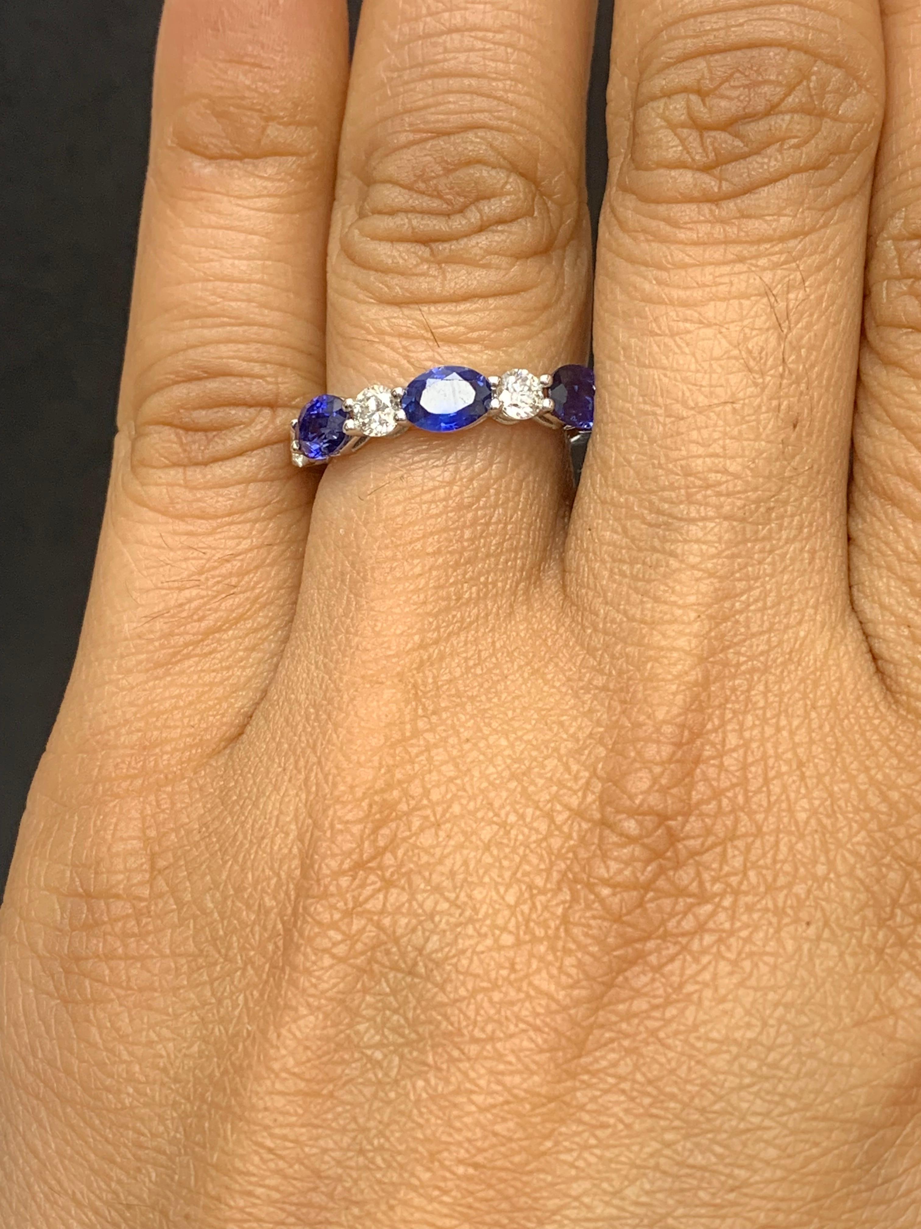 Handcrafted to perfection; showcasing color-rich oval cut sapphires that elegantly alternate round diamonds in a 14k white gold setting. 
The 3 sapphires weigh 1.62 carats total and 4 diamonds weigh 0.61 carats total.

Size 6.5 US (Sizable). One of
