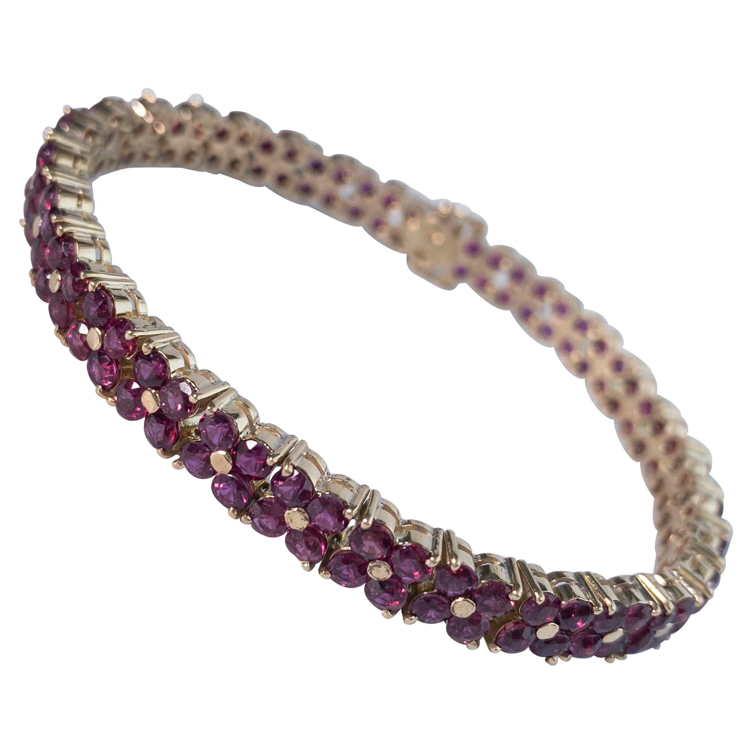 16.2 Carat Ruby Flower Motif Bracelet in 14 Karat Yellow Gold