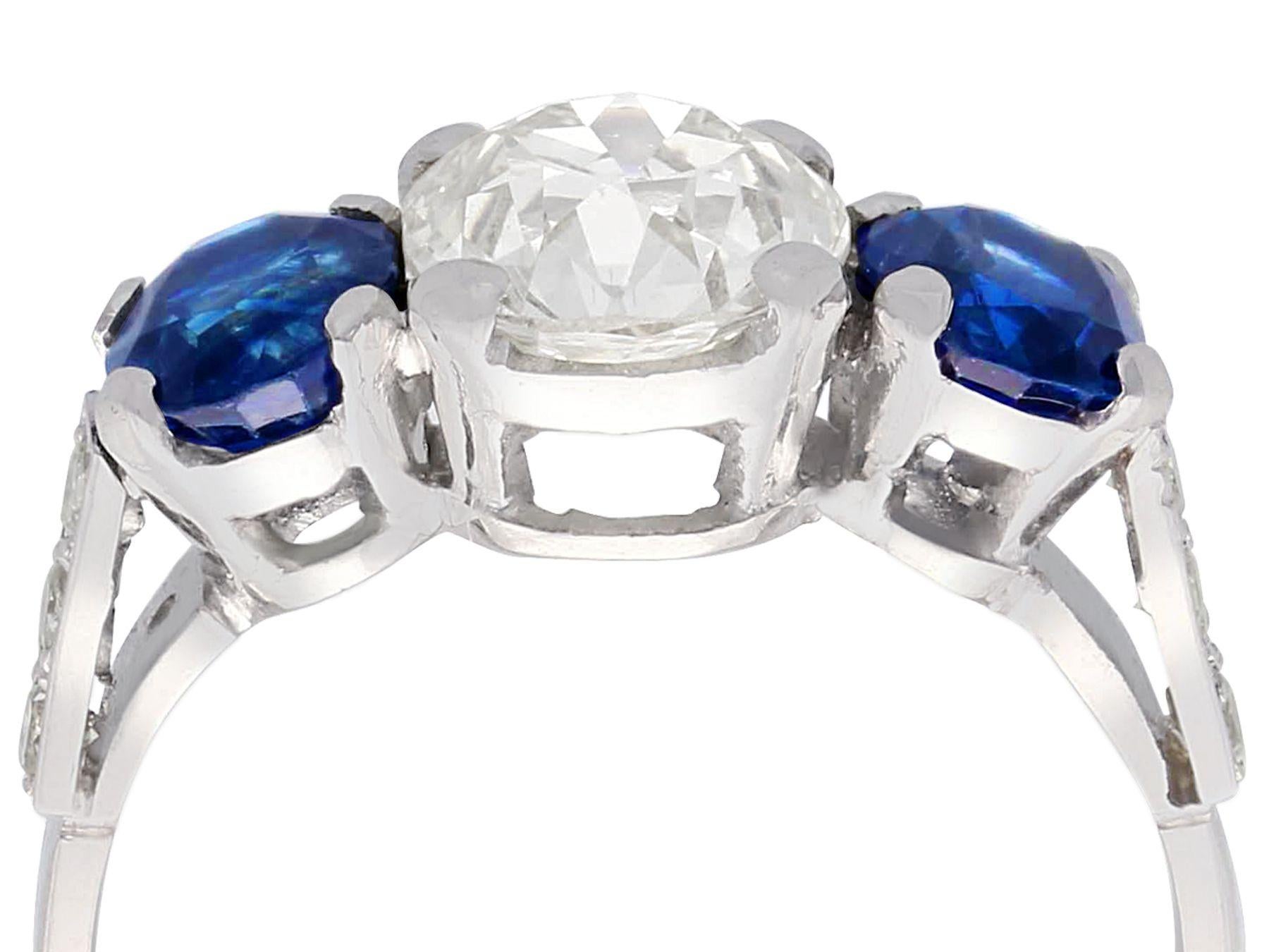 A stunning, fine and impressive 1.62 carat sapphire and 1.86 carat diamond, platinum trilogy ring; part of our diverse sapphire jewelry and estate jewelry collections.

This stunning, fine and impressive sapphire and diamond trilogy ring with