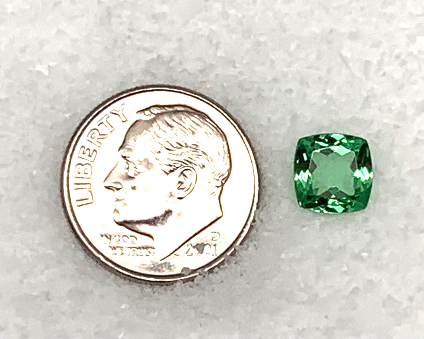 This pretty tsavorite garnet is so bright and lively! The perfect shade of spring green, this gem measures 7.01 x 6.88 x 3.70 millimeters and weighs 1.62 carats. It would be beautiful set in a ring or pendant, is eye clean, and such a happy color! A