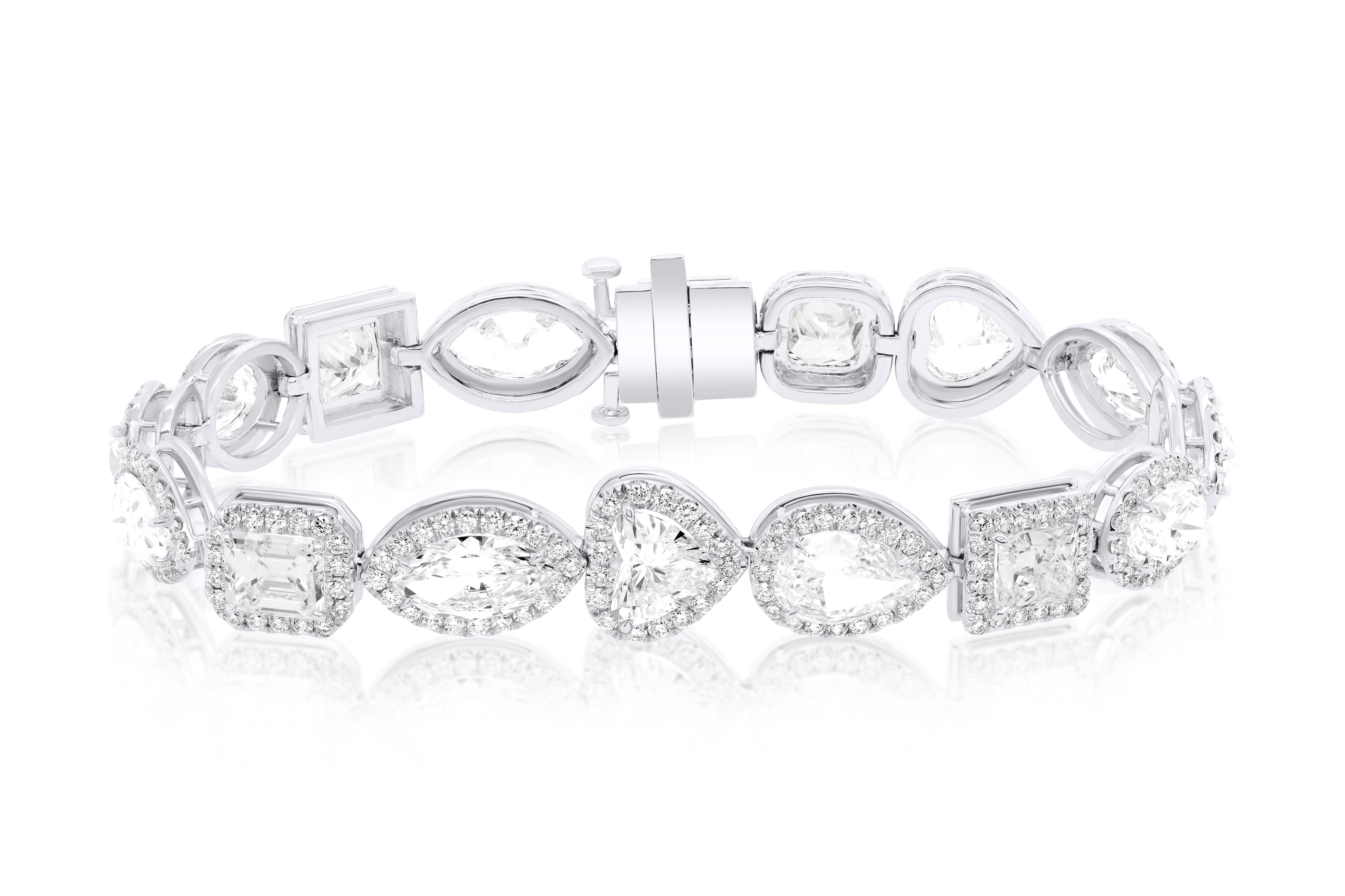 One-of-a-kind Diamond Bracelet features 16.20 carat multi shape diamond tennis bracelet features 16.20 Carats of GIA Certified Diamonds 
D-G in Color VVS-VS in Clarity each diamond certified by GIA. Surrounded by 3.00 Carats of diamonds 

