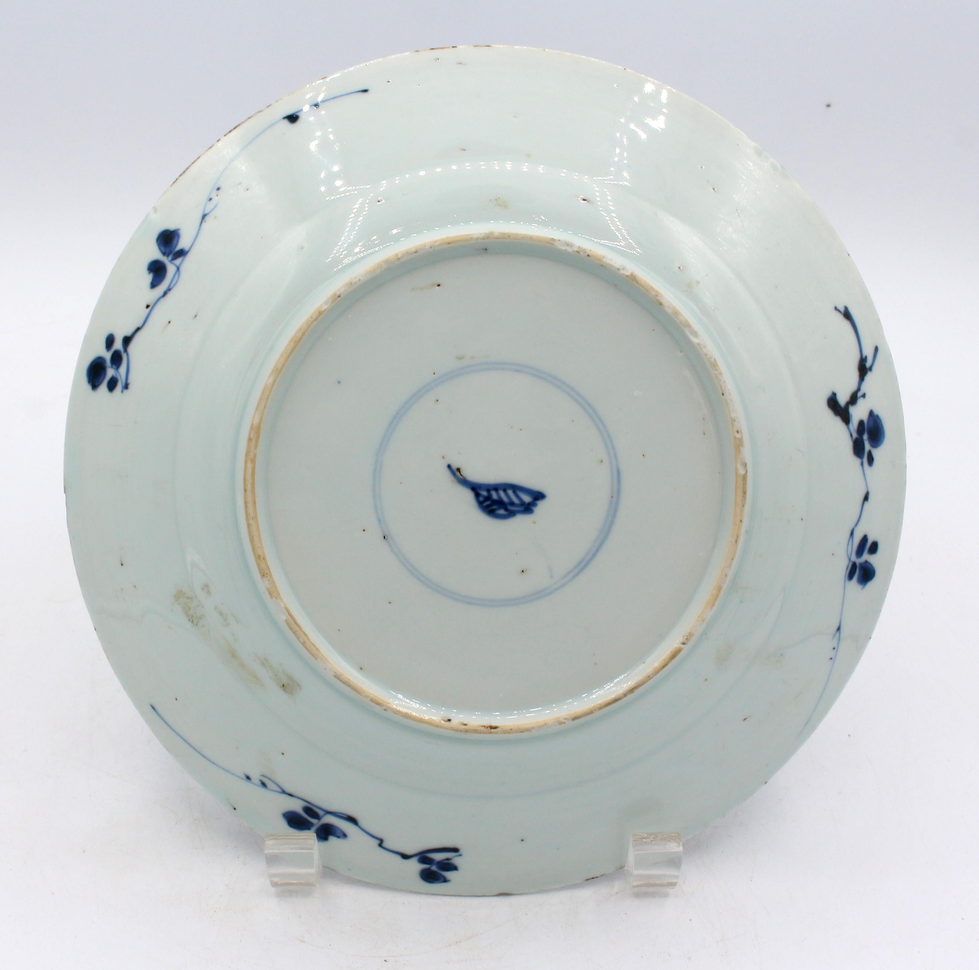 1622-1722 Kangxi blue & white porcelain plate, Chinese export. Charming 6-panel border, artemisia marked. Each border reserve & the central reserve feature branching blossoms. Rim frits & 5/8