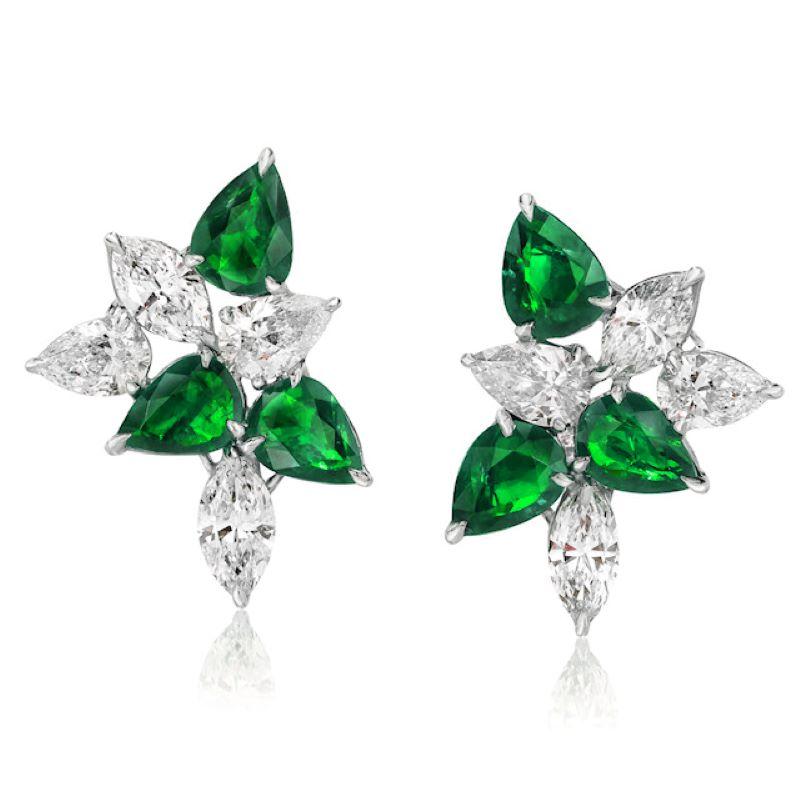 The Classic Cluster Earring. Redefined. Set with Emeralds and Diamonds and Set in Platinum and 18 Karat White Gold.
Emeralds totaling 3.84 Carats.
Diamonds Totaling 4.18 Carats.
8.02 Carats Total

Ring
Emeralds totaling 2.12 Carats.
Diamonds