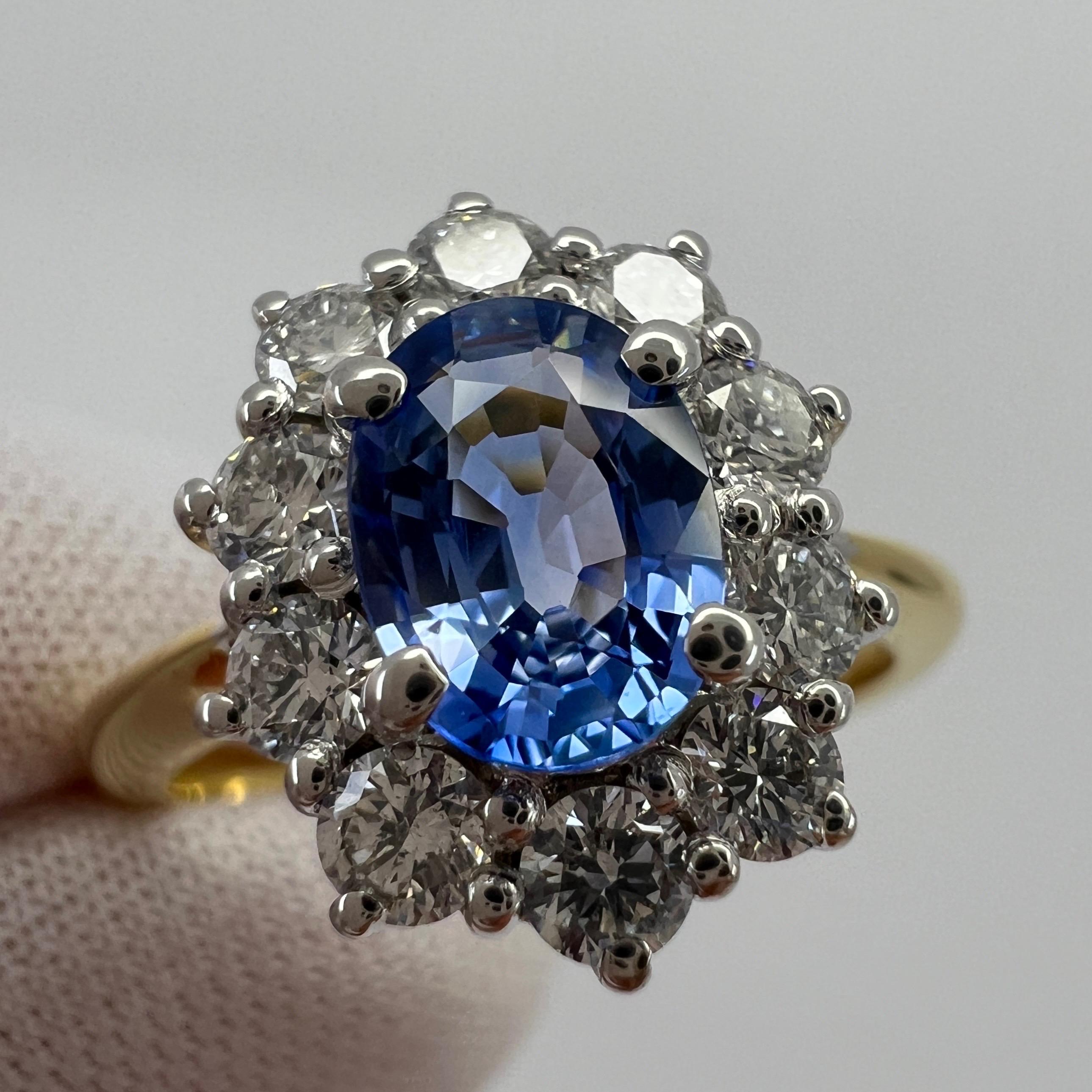 Fine Vivid Blue Oval Cut Ceylon Sapphire & Diamond 18k Gold Cluster Ring 1.62 Total Carat.

Fine colour oval cut Ceylon blue sapphire centre stone. 1.00 carat measuring 7x5.2mm. Has excellent cut and clarity VVS.
Mined in Sri Lanka, source of some