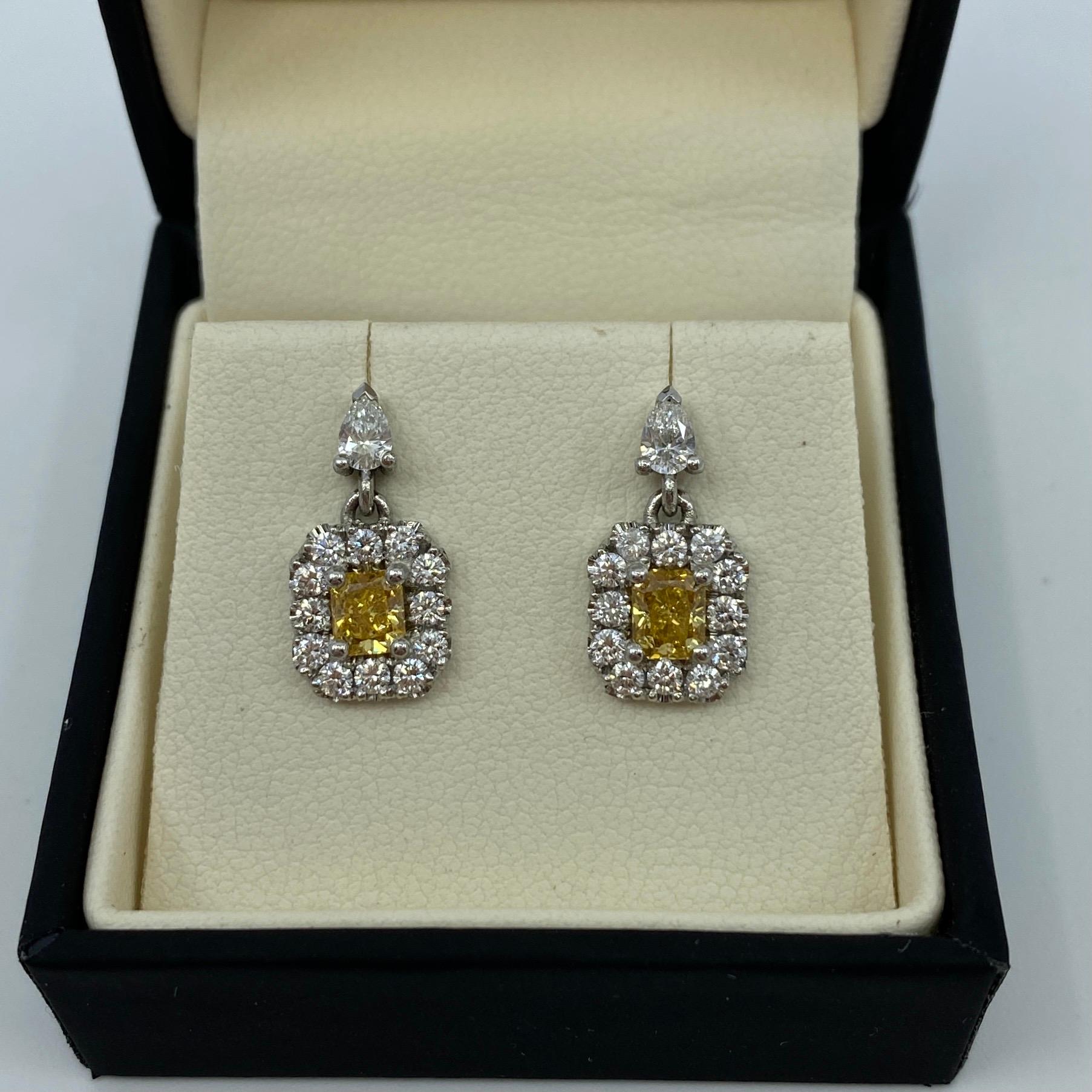 1.62 Total carat GIA Certified Untreated Fancy Intense Yellow Orange Diamond Platinum Halo Earrings.

Fine untreated diamonds with intense orange-yellow colour and an excellent cushion cut. Certified by GIA. 0.69 total carat, these fancy diamonds