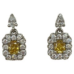 1,62 Karat GIA zertifizierte extravagante gelbe und orangefarbene Diamant-Halo-Ohrstecker