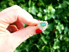 1.63 Carat Emerald and 2.31 Carat Diamond Yellow Gold Ring