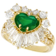 1.63 Carat Emerald and 2.31 Carat Diamond Yellow Gold Ring