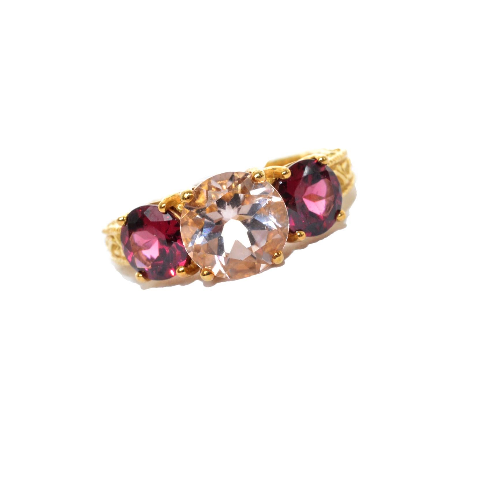 Sunita Nahata presents a collection of bold yet dainty cocktail ring! The morganite in the center is in classic round cut while the rhodolite stone on either side is in round cut. These rings are made in yellow gold and present a classic yet elegant