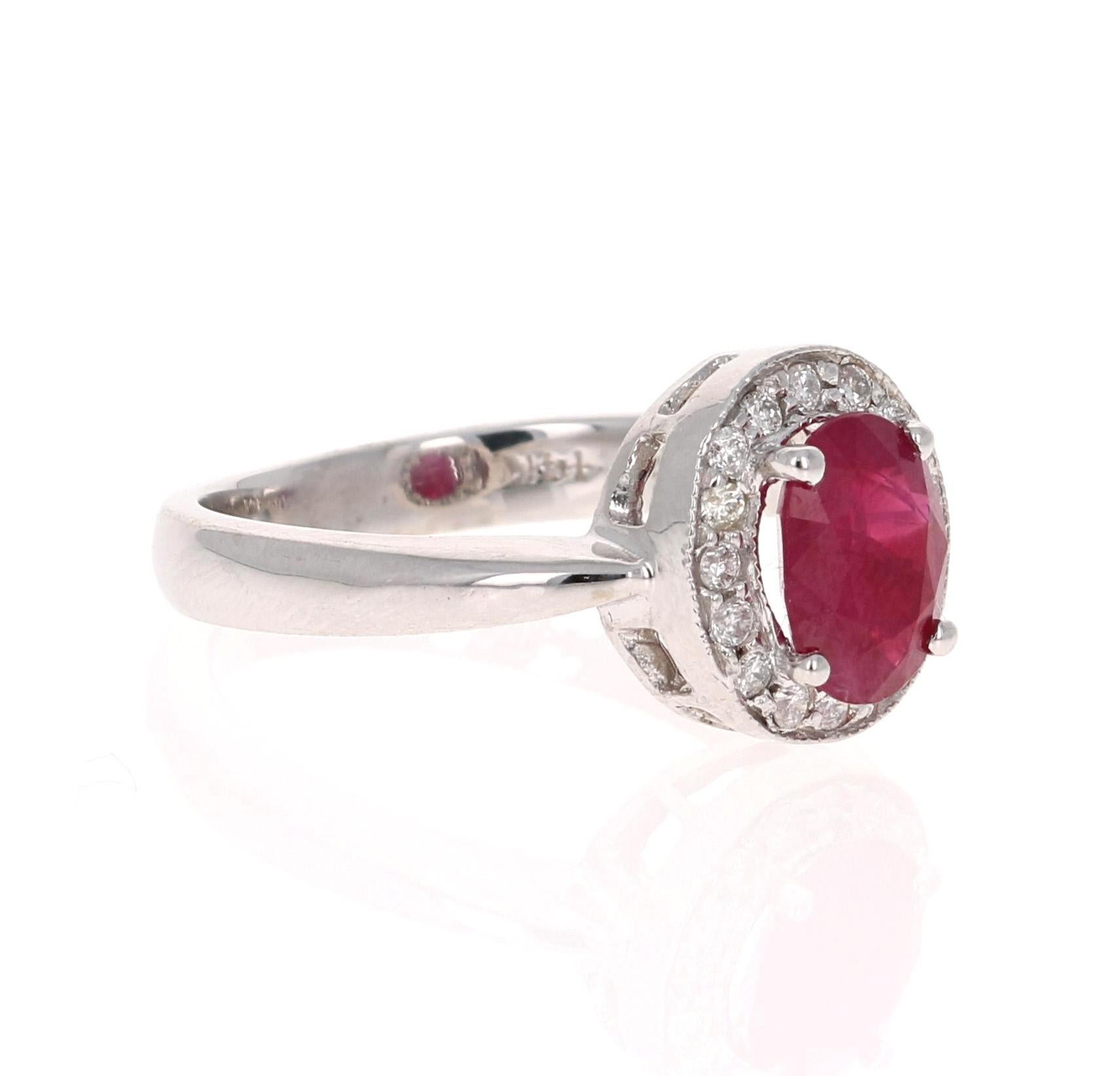 Stunning Ruby Diamond Ring with a 1.45 Carat Oval Cut Ruby and 16 Round Cut Diamonds that weigh 0.18 carats. The total carat weight of the ring is 1.63 carats. (Clarity: SI, Color: F)

The origins of the Ruby are from Mozambique, Africa. The ruby