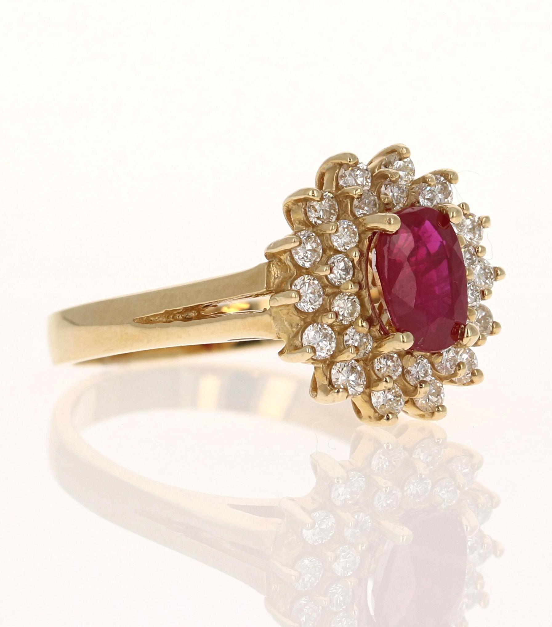 This Ring has a Oval Cut Natural Ruby that measures at approximately 7 mm x 4.5 mm and weighs at 1.14 carats. It also has 28 Round Cut Diamonds that weigh 0.49 carats. The total carat weight of the ring is 1.63 carats. 

The clarity and color of the