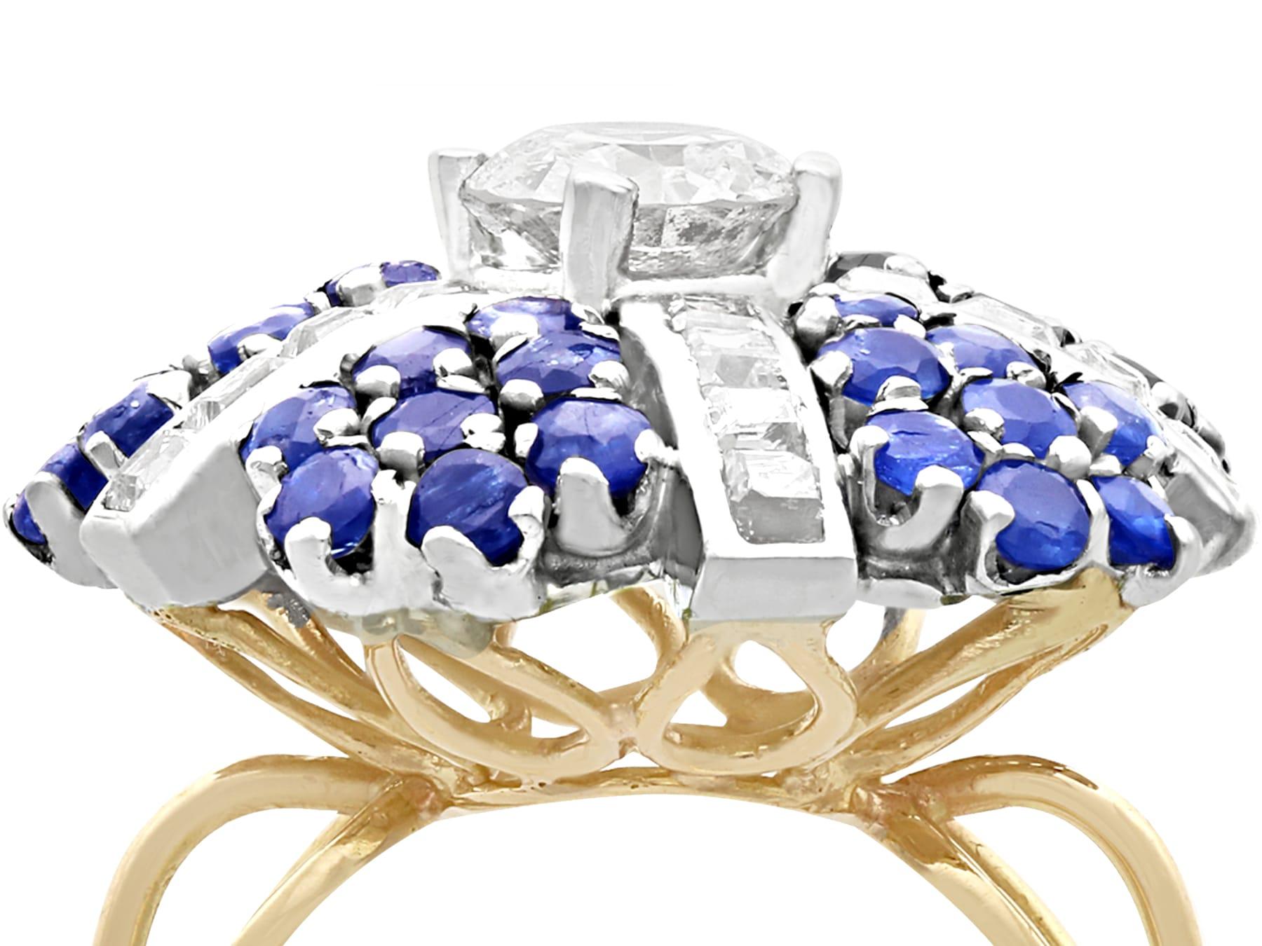 An impressive vintage 1.63 carat sapphire and 1.67 carat diamond, 14 karat yellow and white gold cluster ring; part of our diverse vintage jewelry collections.

This fine and impressive vintage sapphire and diamond cocktail ring has been crafted in
