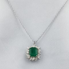 Collana con ciondolo: smeraldo dello Zambia da 1,63 ct e diamante da 0,62 ct SI/H, in oro bianco 18k