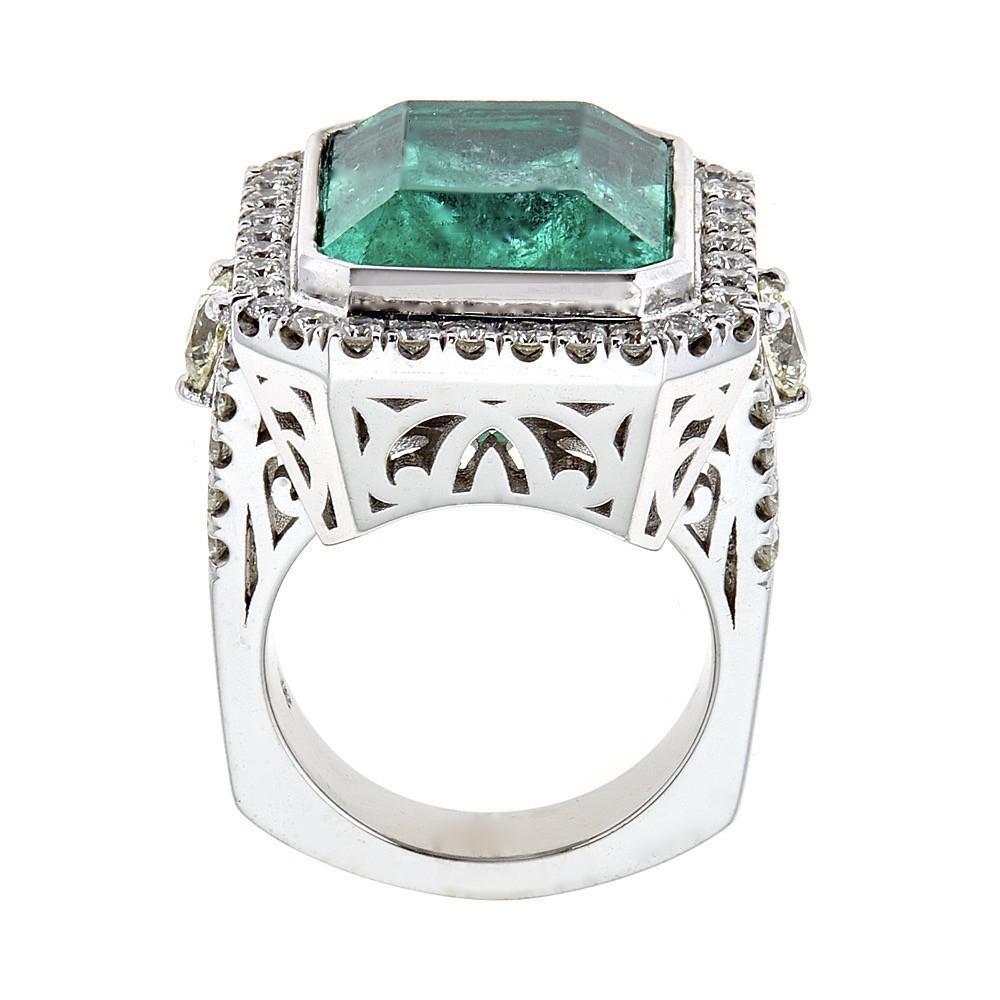 Showcasing a 16.35-carat emerald, this handcrafted 14K white gold ring is accentuated with round brilliant diamonds.