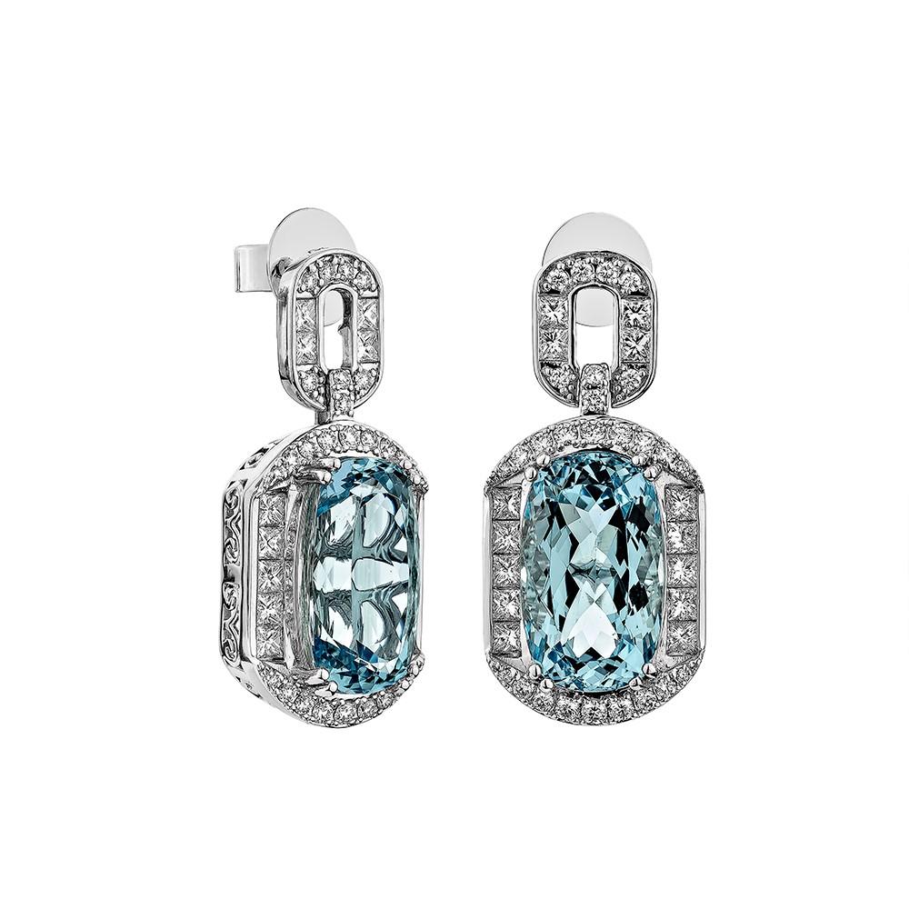 Presented an antique Aquamarine Drop Earring that is accented with White Diamond all around and enhances the beauty of the Earring. This Earring accented with Diamonds is made in White Gold, which looks very Elegant.

Aquamarine Drop Earring in