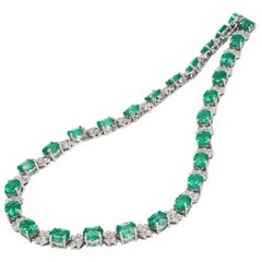 16.37ctw Emerald and 3.07ctw Diamond 18K White Gold Necklace
