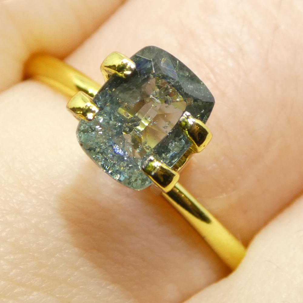 Description:

Gem Type: Sapphire 
Number of Stones: 1
Weight: 1.63 cts
Measurements: 7.18 x 5.65 x 3.75 mm
Shape: Cushion
Cutting Style Crown: Brilliant Cut
Cutting Style Pavilion: Step Cut 
Transparency: Transparent
Clarity: Slightly Included: Some