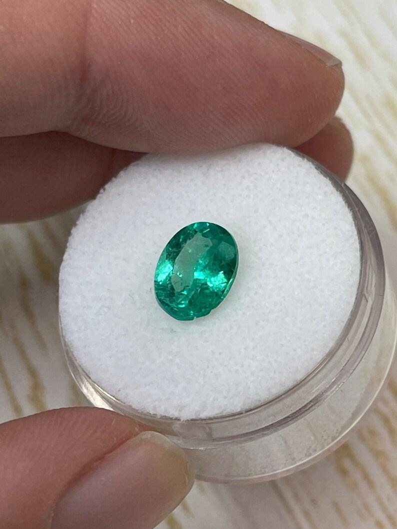1.64 Carat 9x7 Green Colombian Emerald - Oval Cut May Birthstone Gem In New Condition For Sale In Jupiter, FL