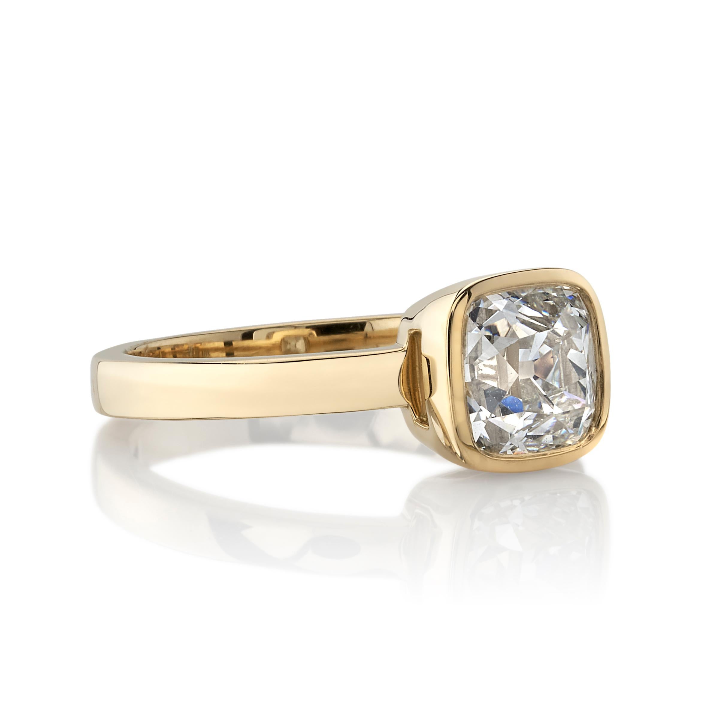 1.64ctw I/VS1 GIA certified antique cushion cut diamond set in a handcrafted 18K yellow gold mounting.

