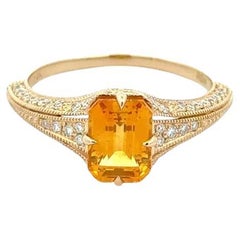 1.64 Carat Emerald Cut Orangish Yellow Sapphire and Diamond Gold Vintage Ring