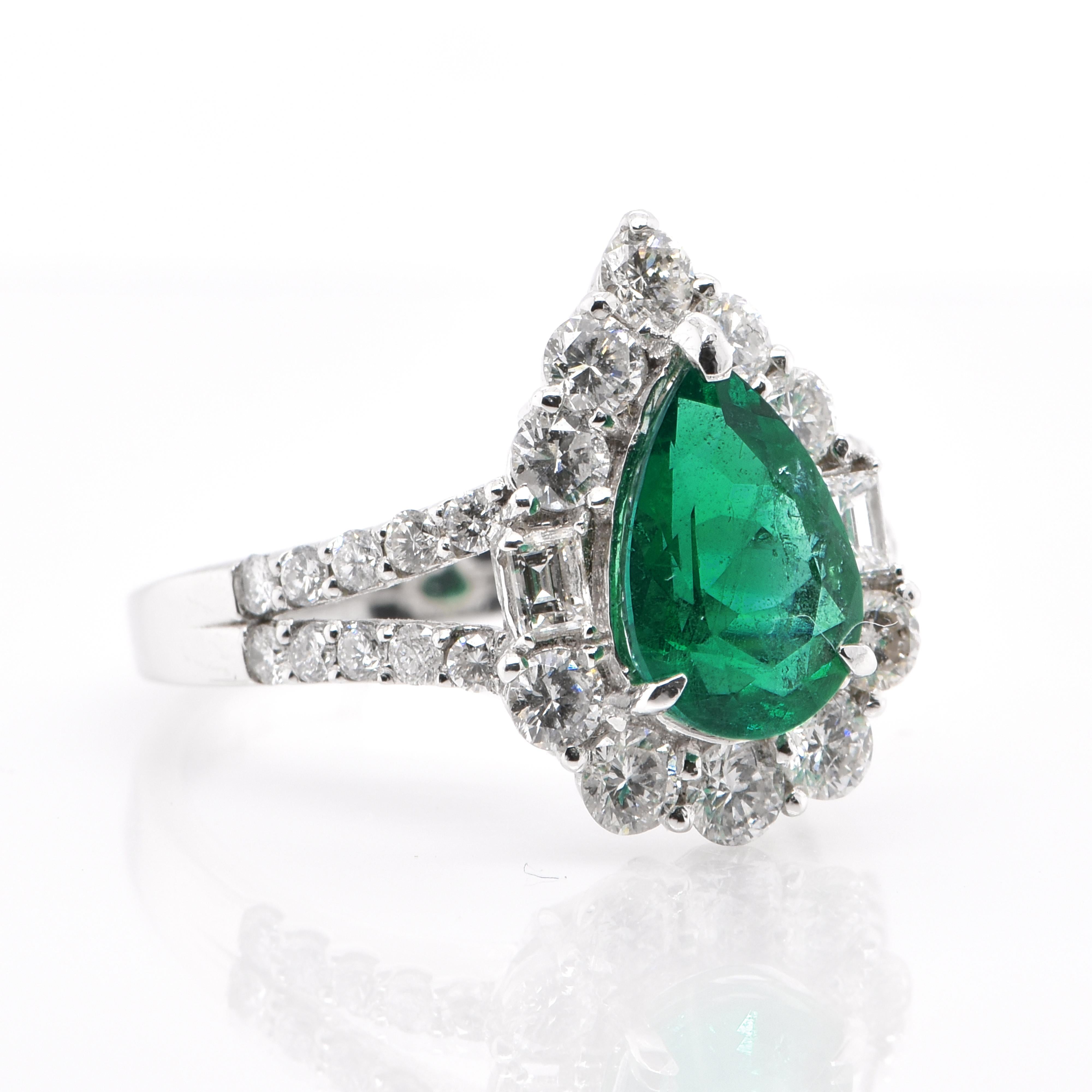 A beautiful Ring featuring a 1.64 Carat, Pear-Shape, Natural, Colombian Emerald and 1.20 Carats of Round Brilliant Diamond Accents set in Platinum. People have admired emerald’s green for thousands of years. Emeralds have always been associated with