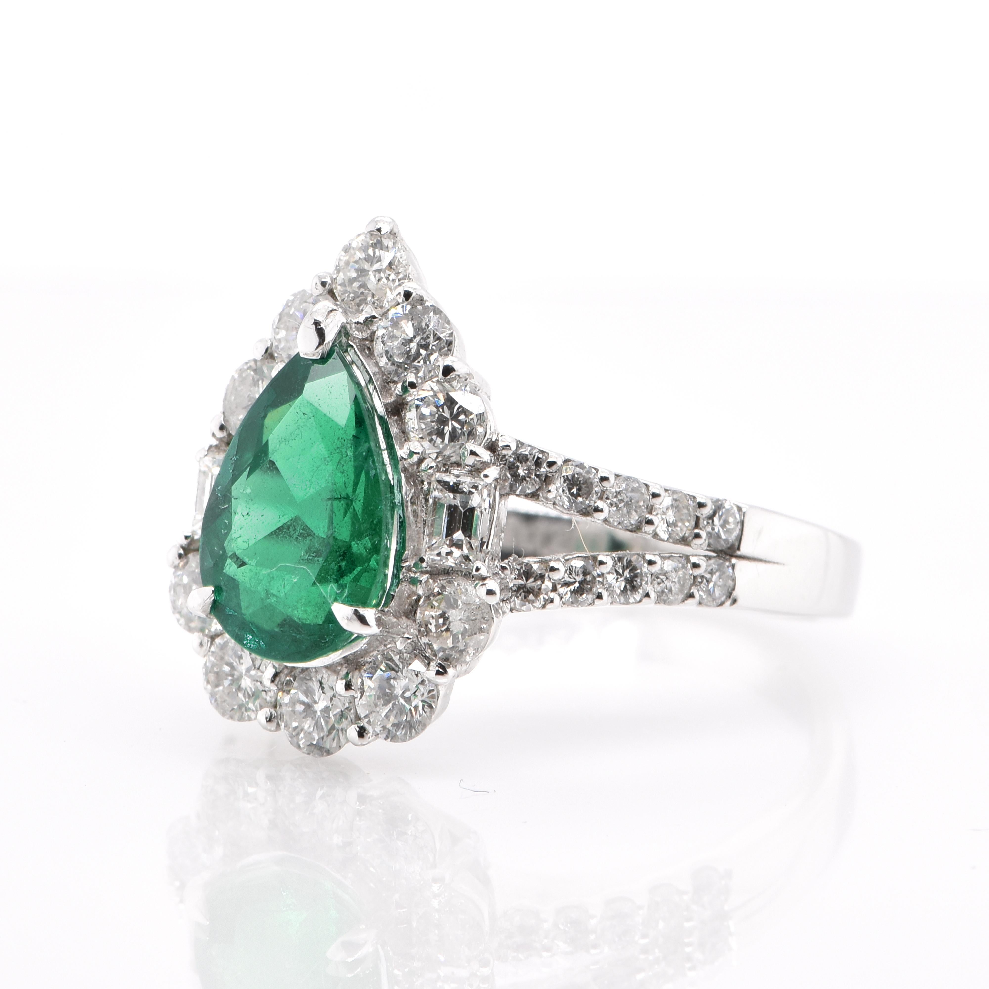 Modern 1.64 Carat Natural Pear Shape Emerald and Diamond Ring Set in Platinum