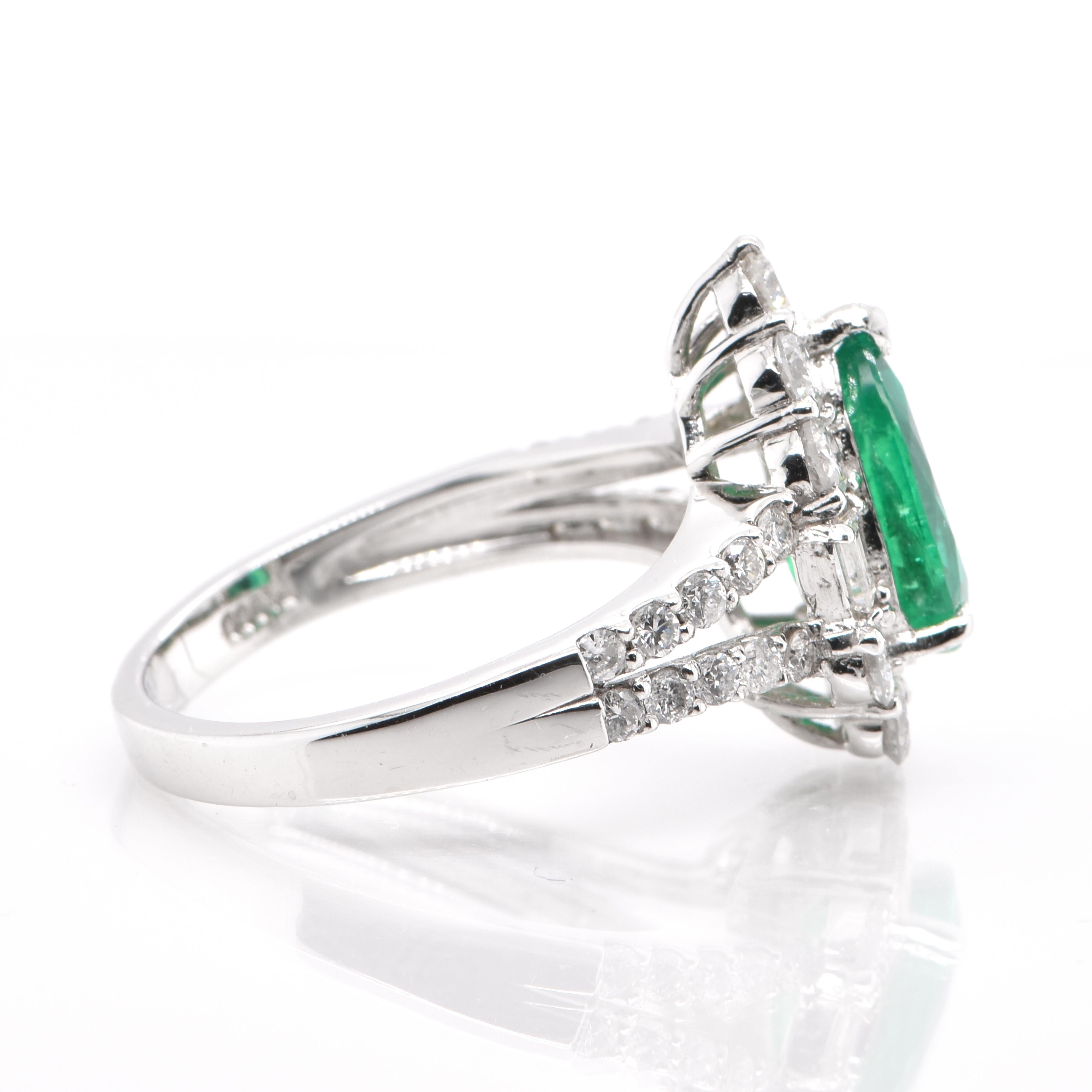 1.64 Carat Natural Pear Shape Emerald and Diamond Ring Set in Platinum In New Condition In Tokyo, JP