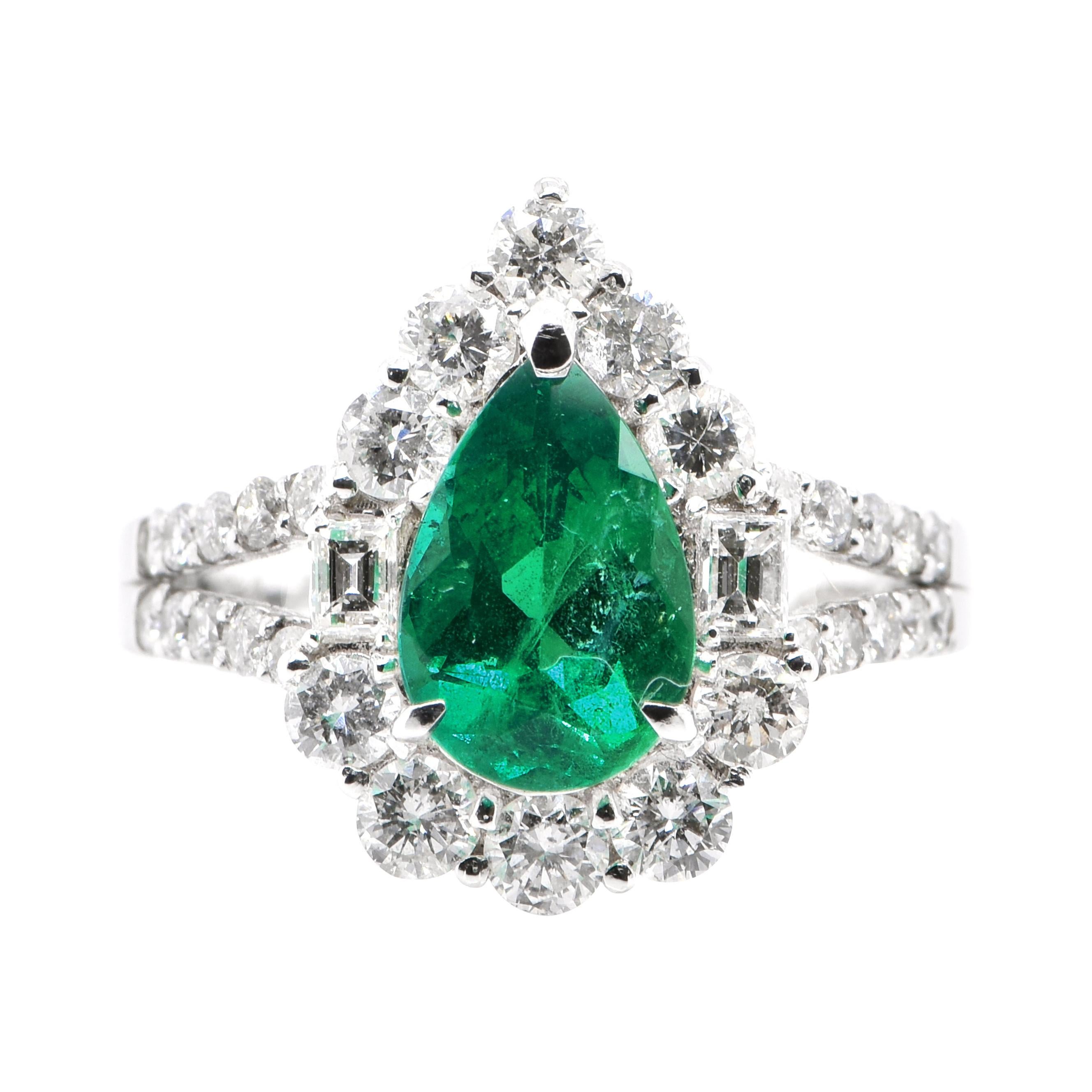 1.64 Carat Natural Pear Shape Emerald and Diamond Ring Set in Platinum