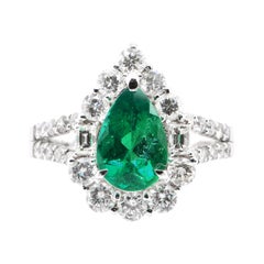 1.64 Carat Natural Pear Shape Emerald and Diamond Ring Set in Platinum