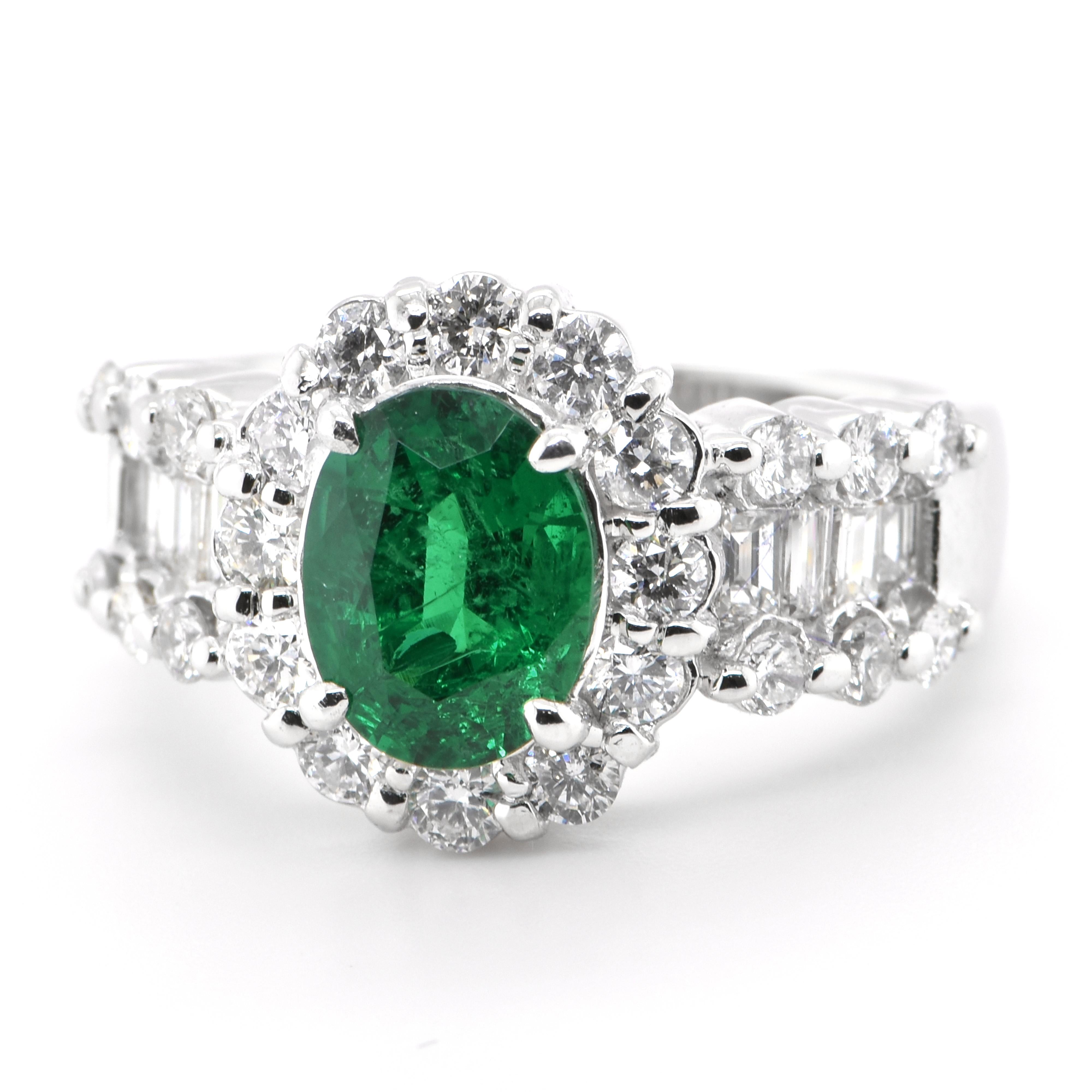 A stunning cocktail ring featuring a 1.64 Carat Natural Emerald and 1.31 Carats of Diamond Accents set in Platinum. People have admired emerald’s green for thousands of years. Emeralds have always been associated with the lushest landscapes and the