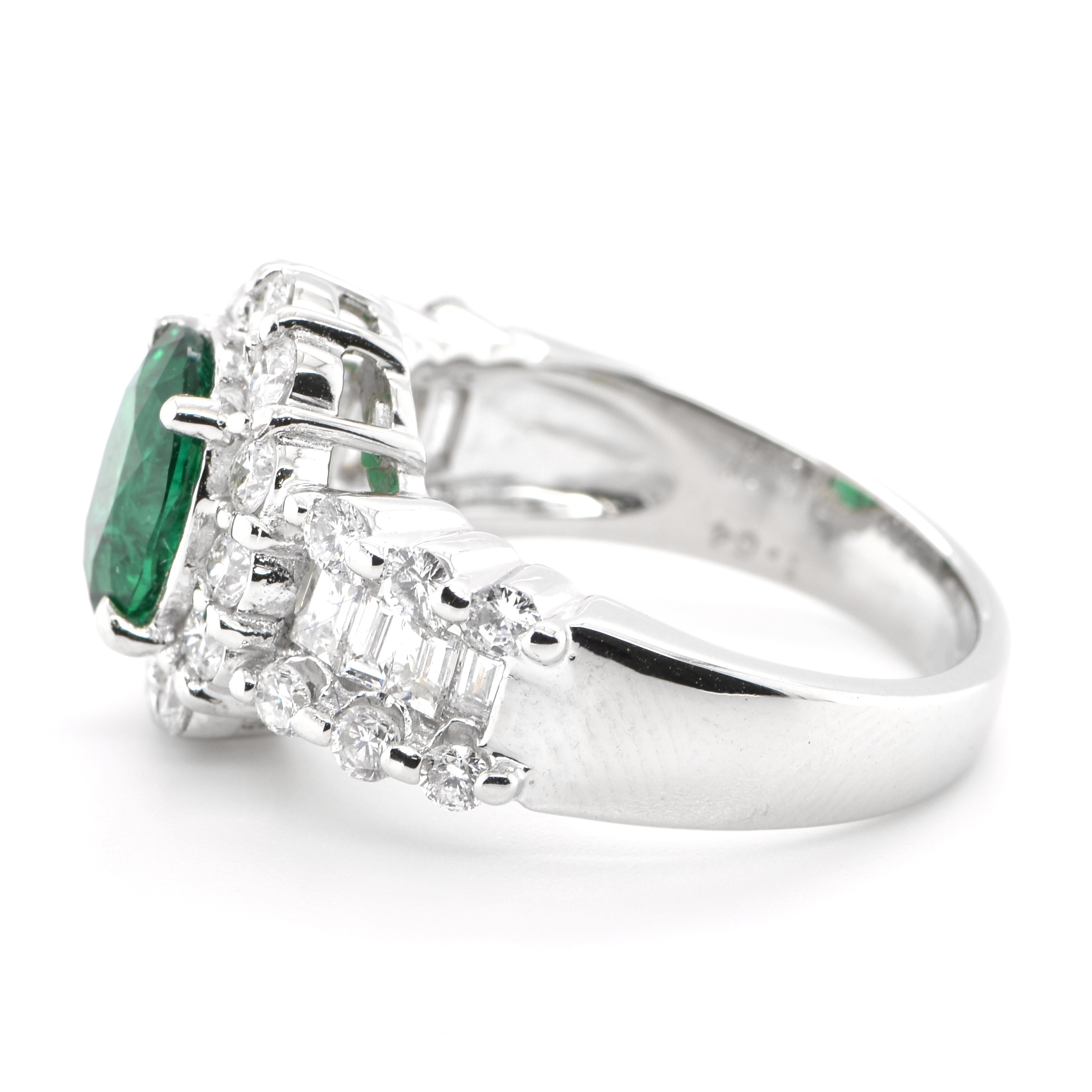 Oval Cut 1.64 Carat Natural Emerald and Diamond Halo Ring Set in Platinum