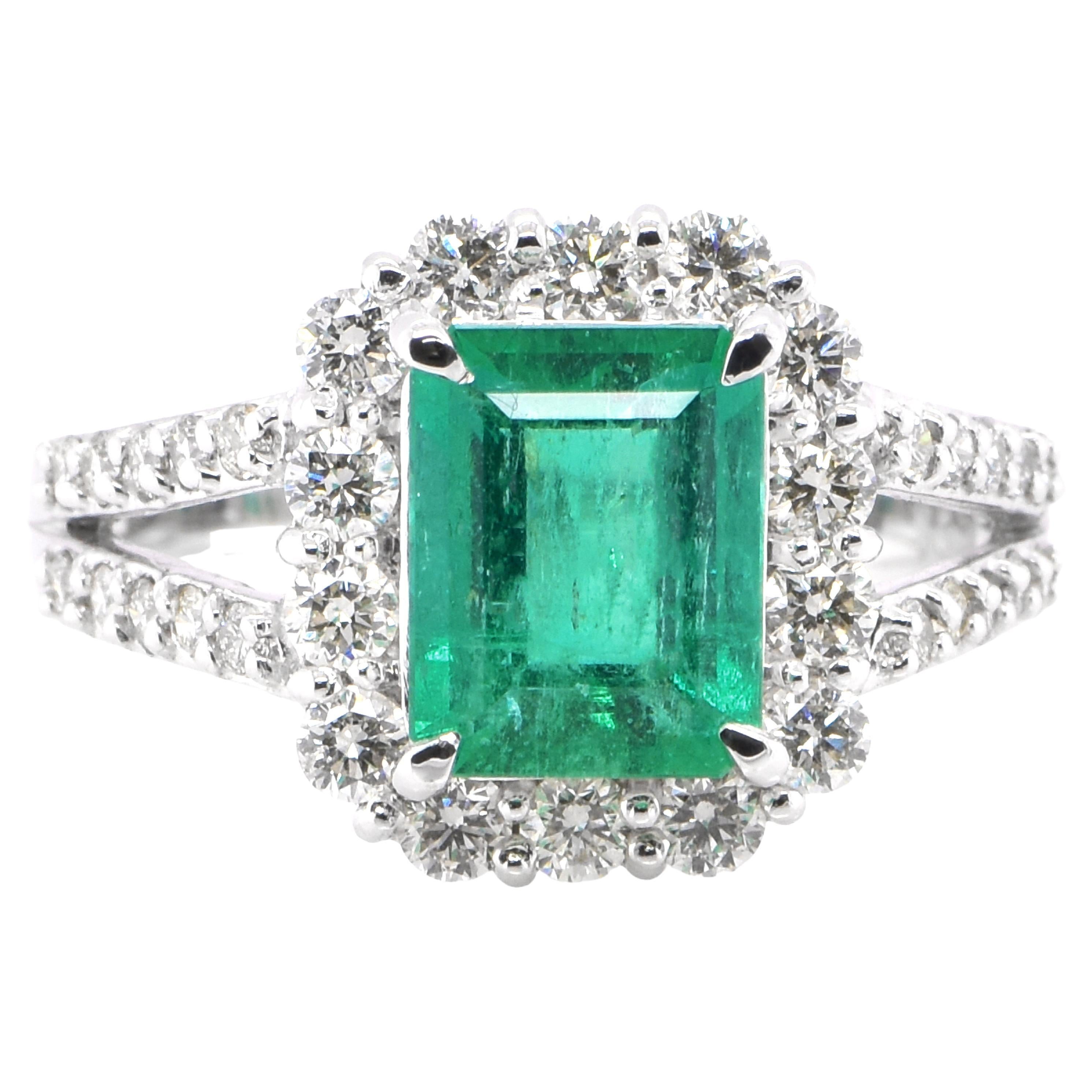 1.64 Carat Natural Emerald and Diamond Halo Ring Set in Platinum For Sale